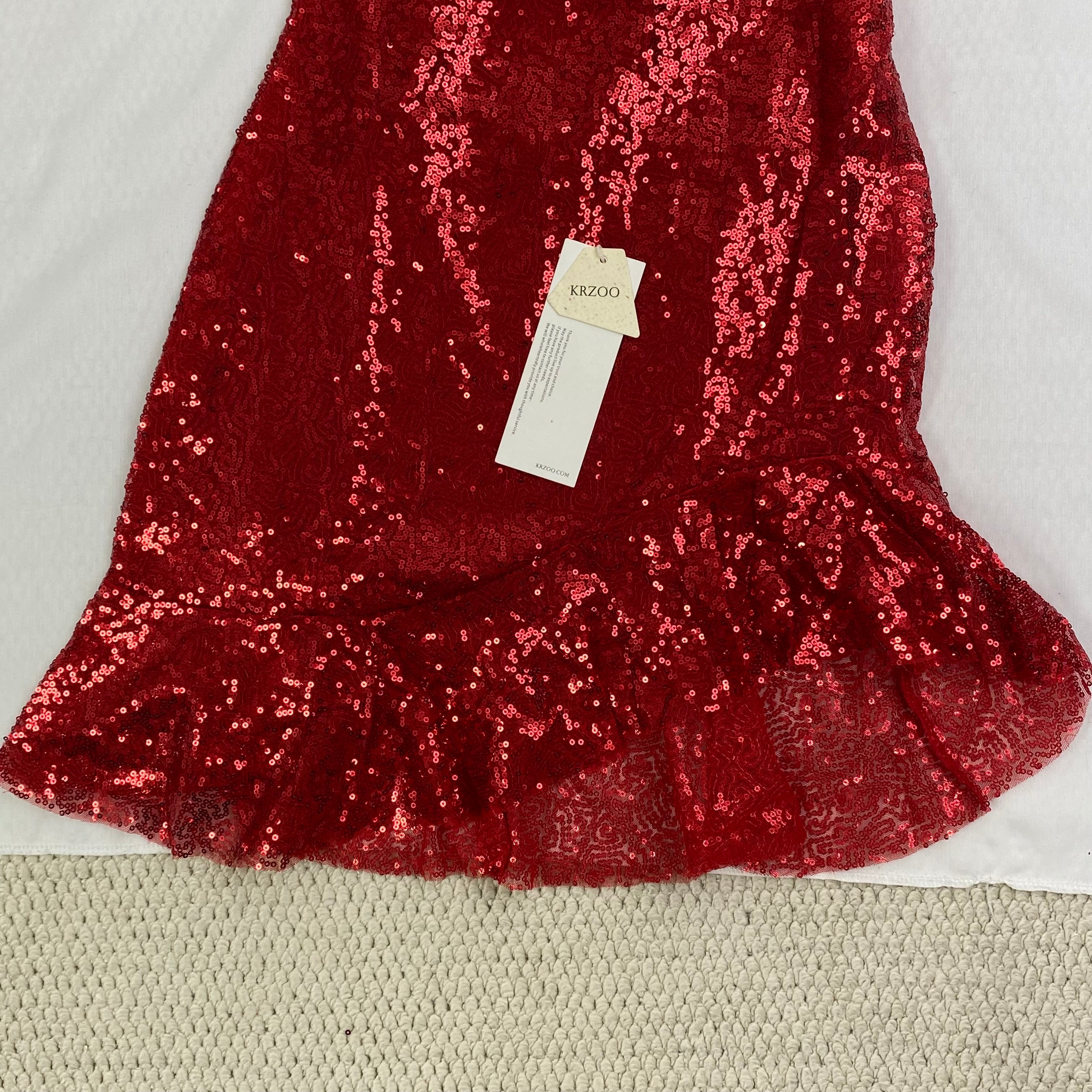 sequined strapless ruffled dress