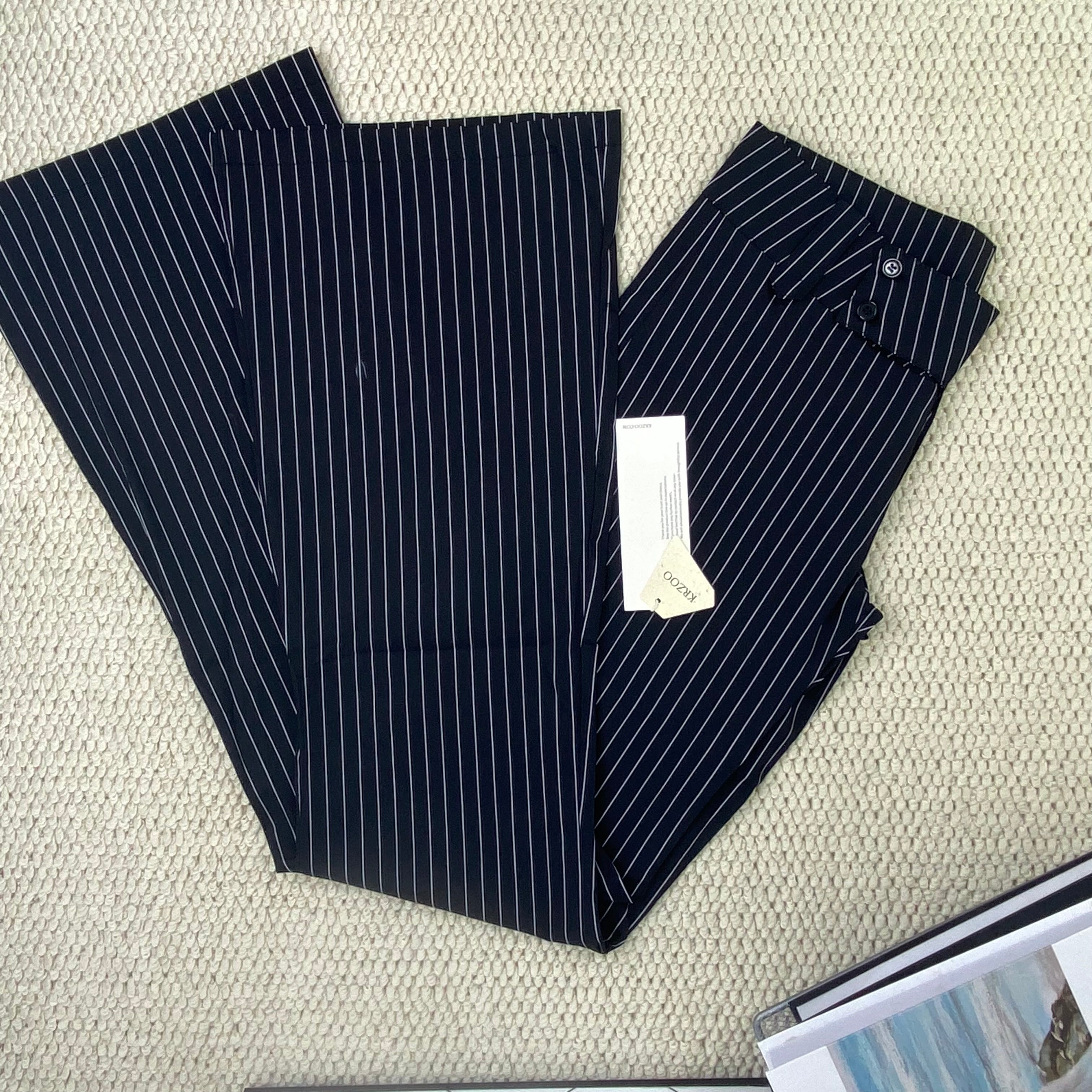Striped pants are versatile and help slim the figure