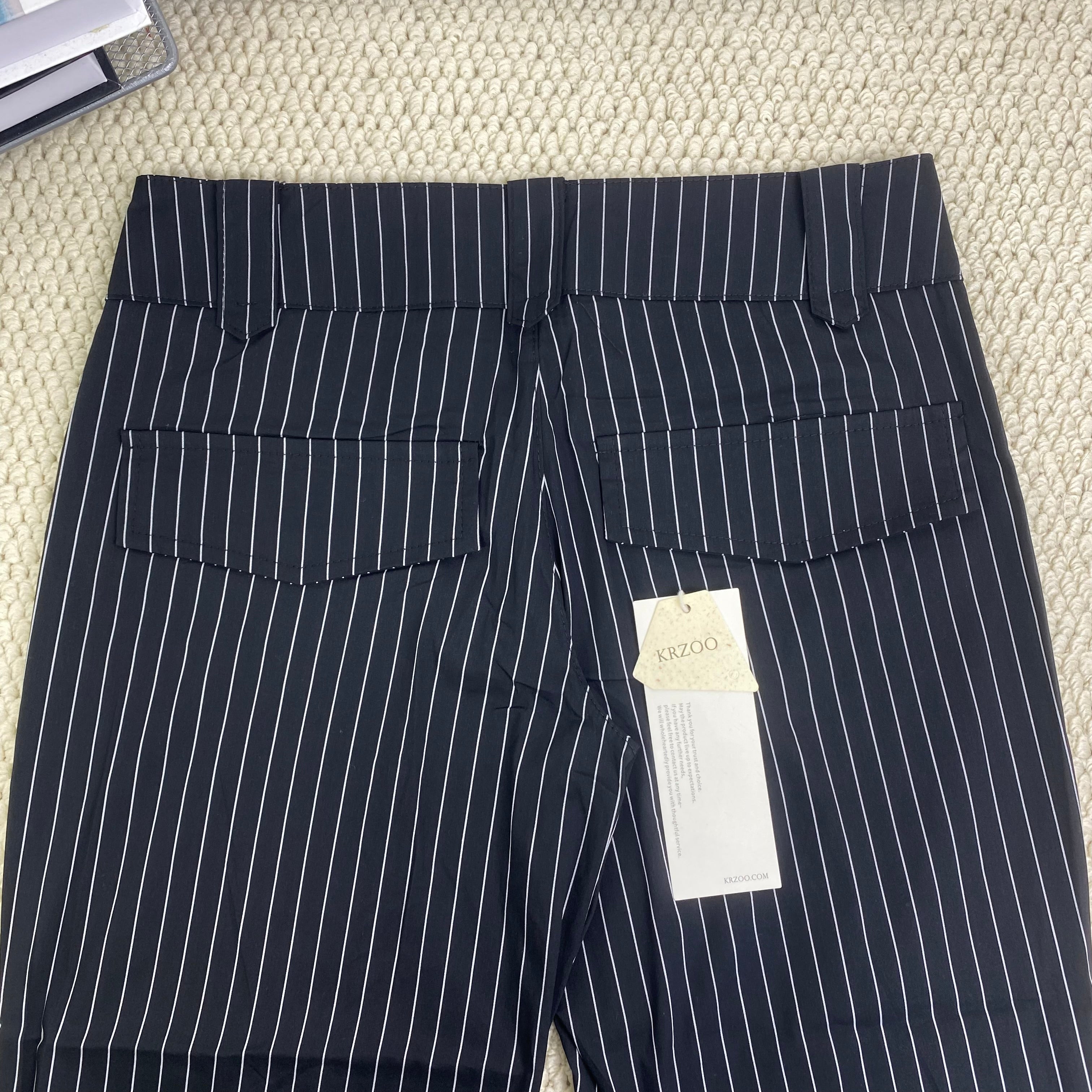 Striped pants are versatile and help slim the figure