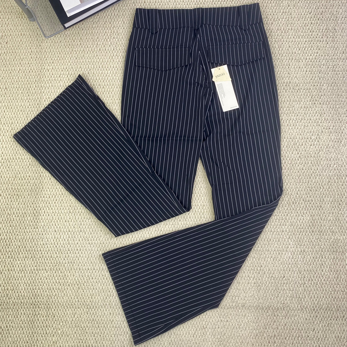 Striped pants are versatile and help slim the figure