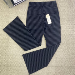 Striped pants are versatile and help slim the figure