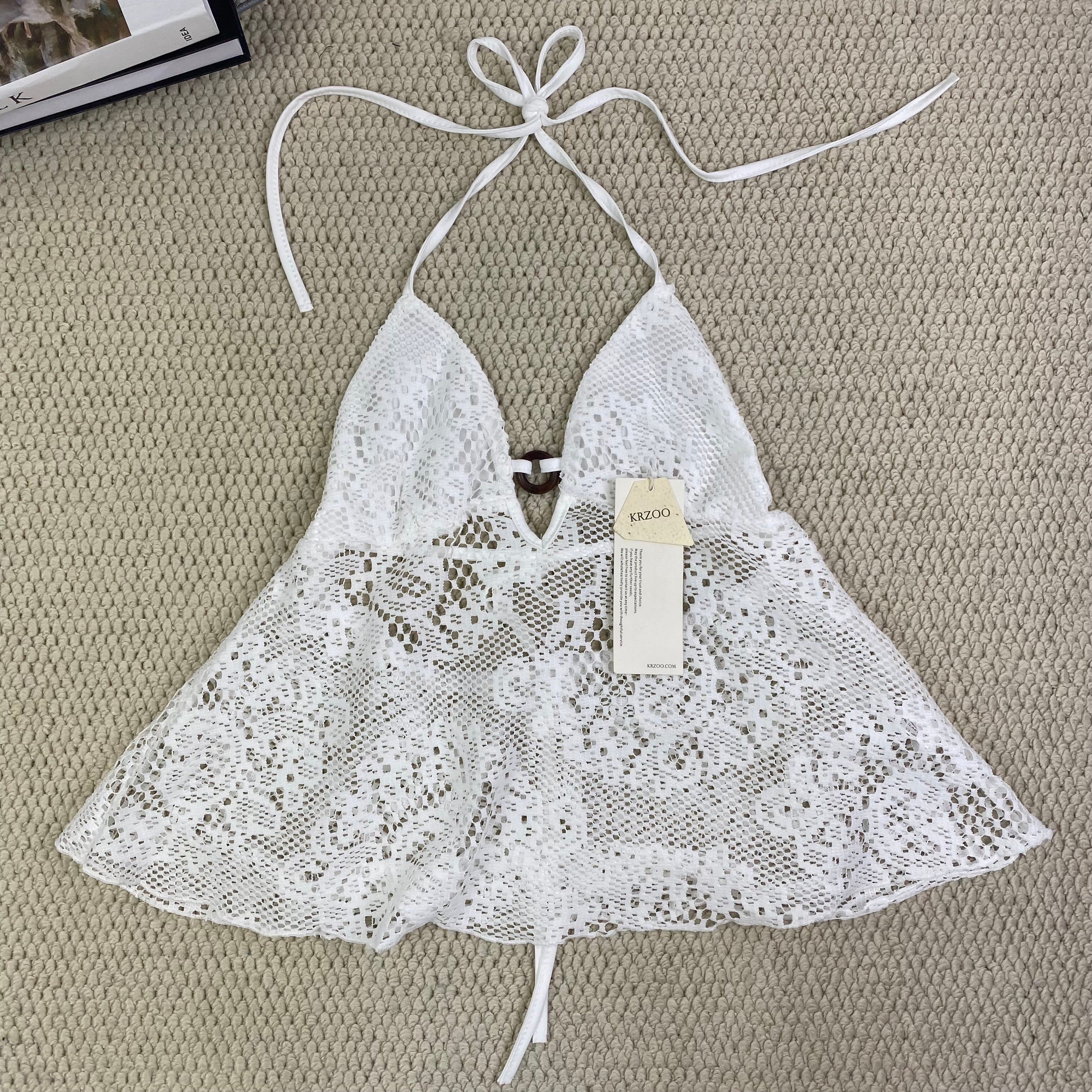 Ruffled lace circular necked top with hollow design