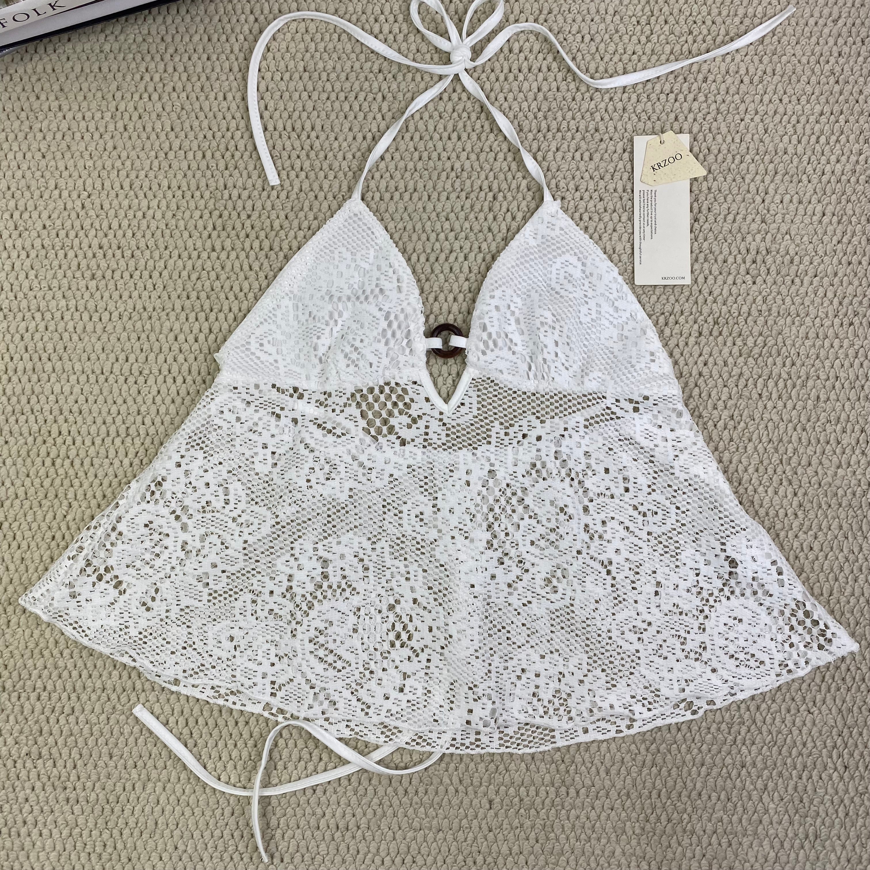 Ruffled lace circular necked top with hollow design
