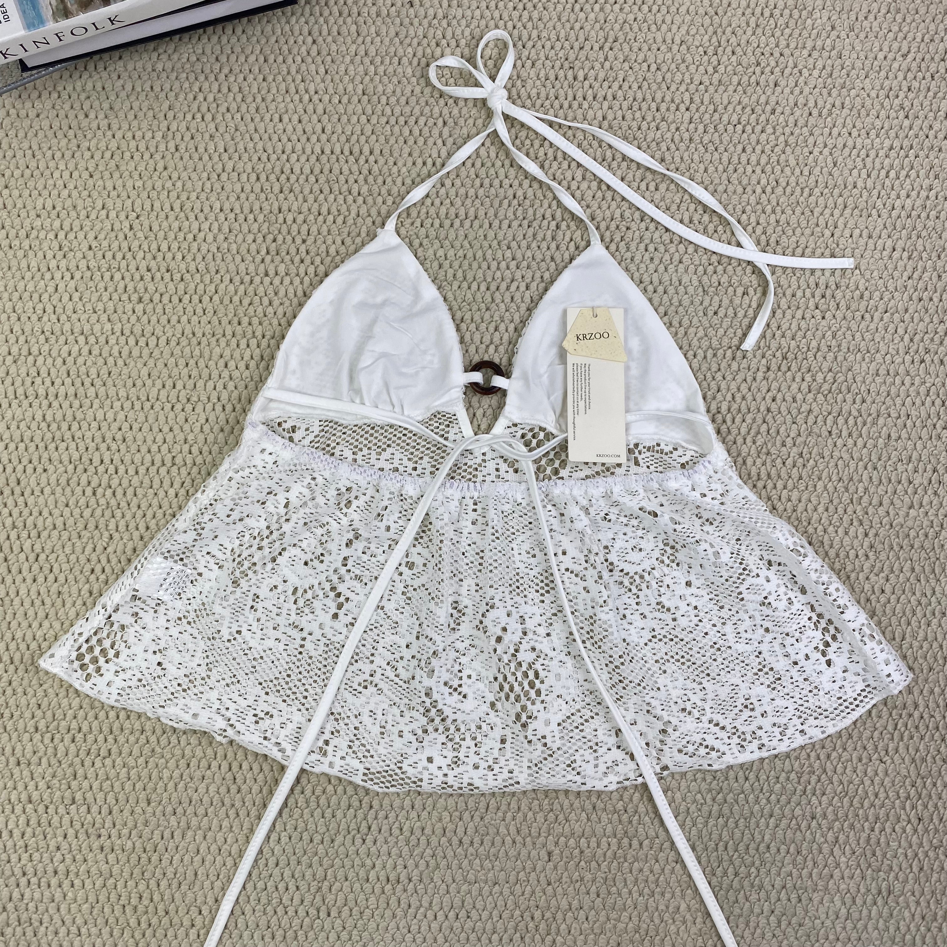 Ruffled lace circular necked top with hollow design