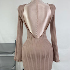 A fitted, ruffled edge knitted long dress