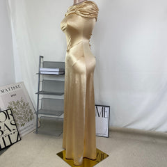 A figure-hugging one-shoulder dress
