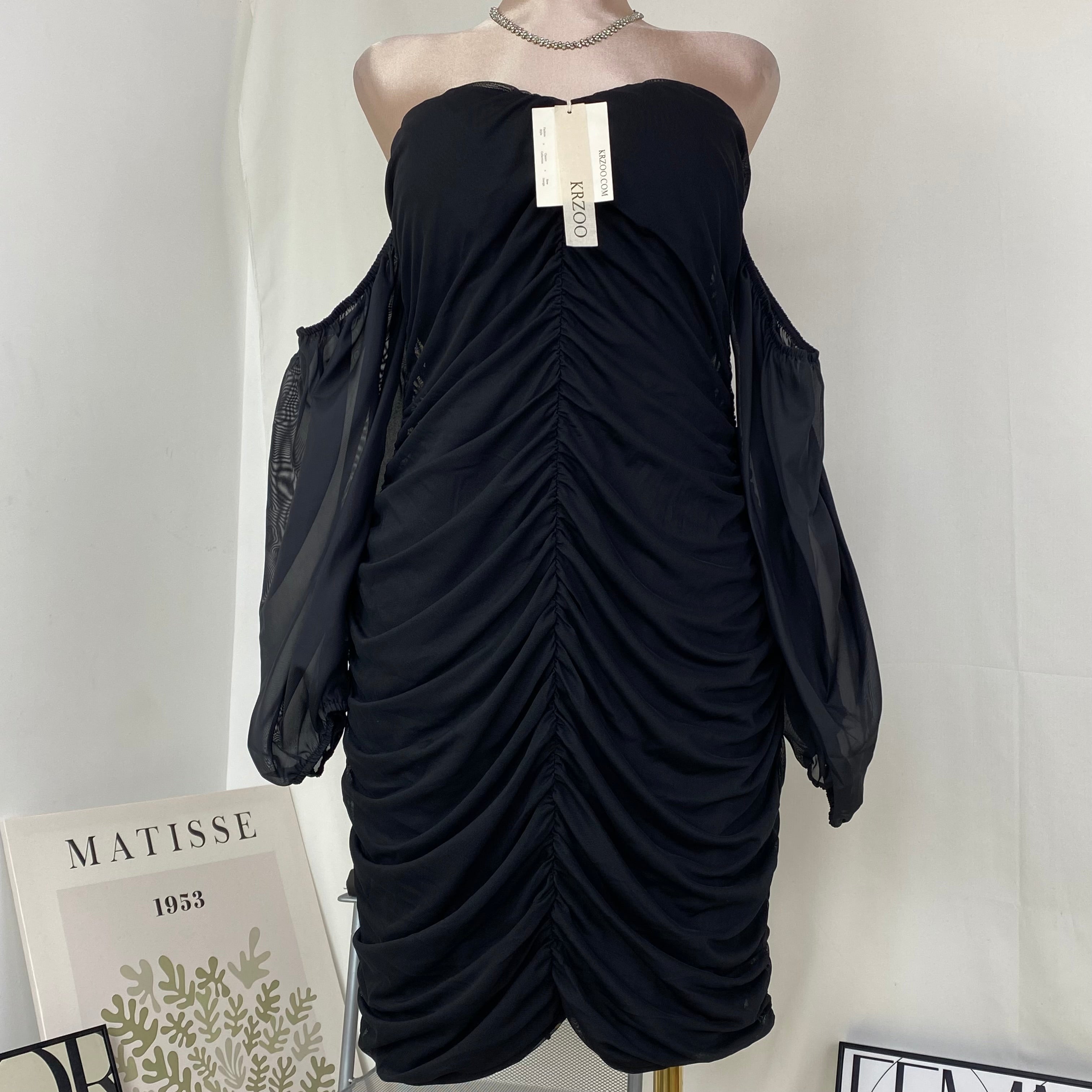 A tight-fitting short dress with a plunging neckline