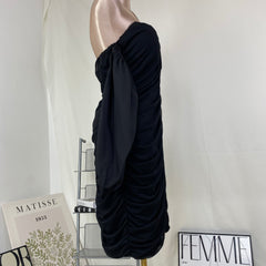 A tight-fitting short dress with a plunging neckline