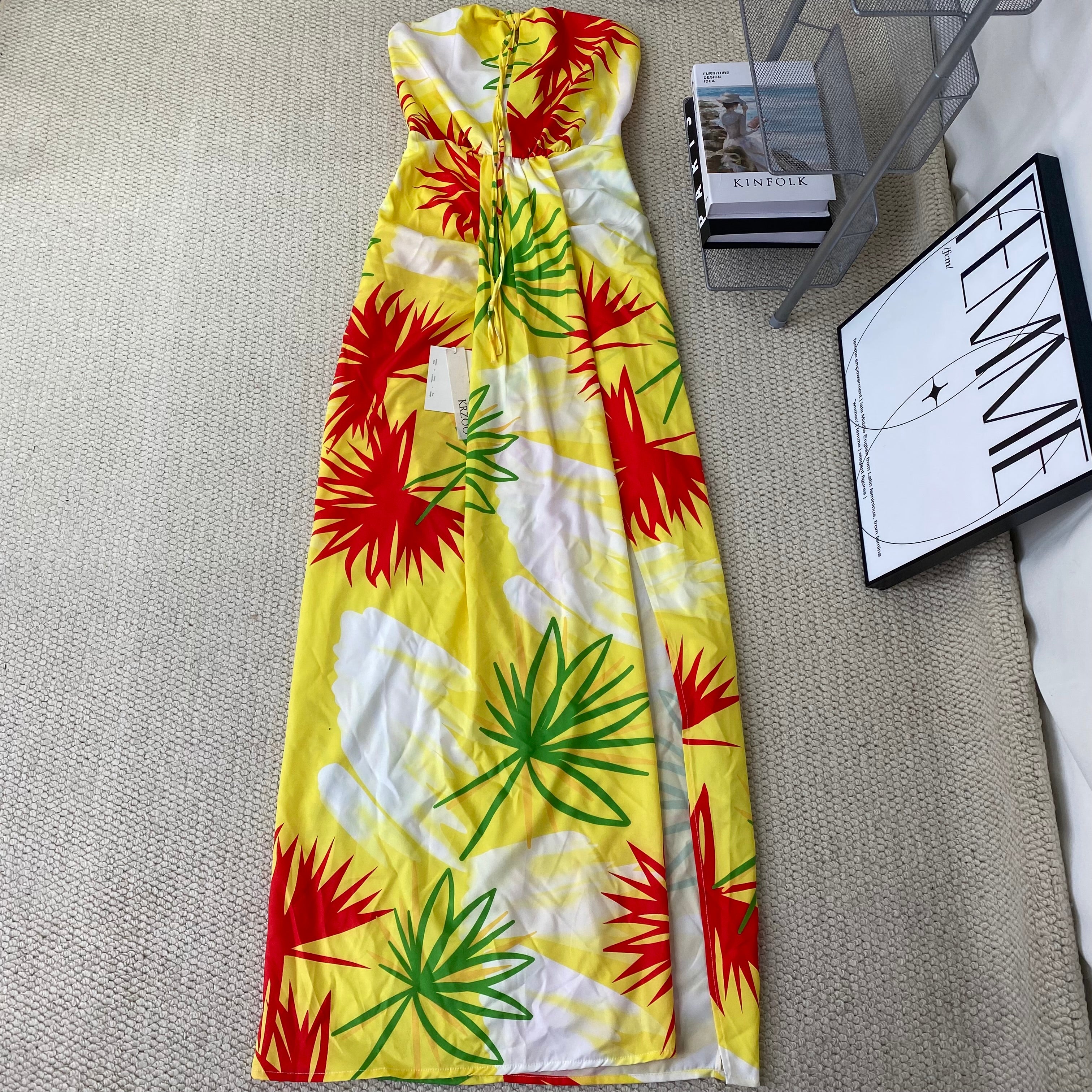 A strapless floral-printed halter dress