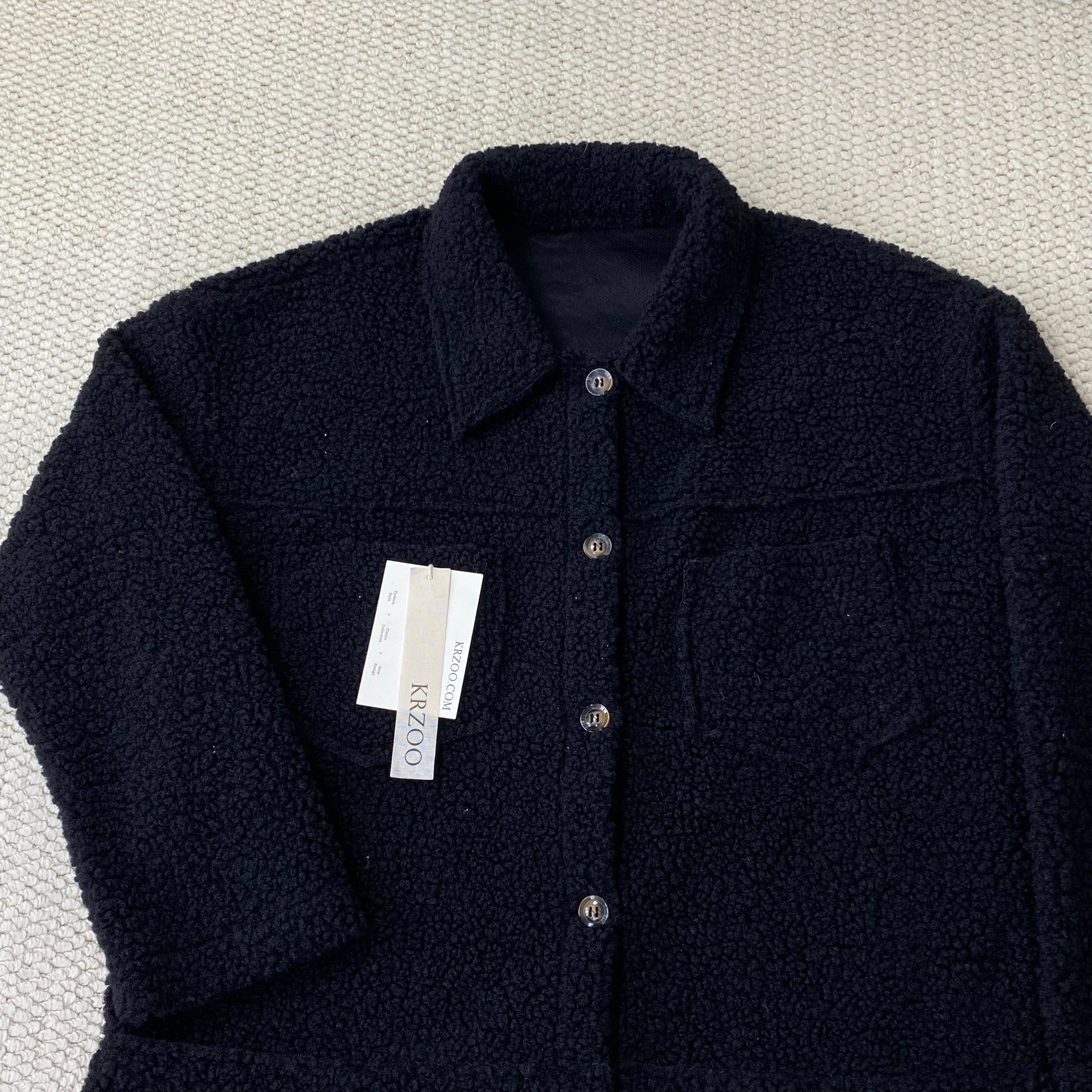 Collared single-breasted sheepskin coat