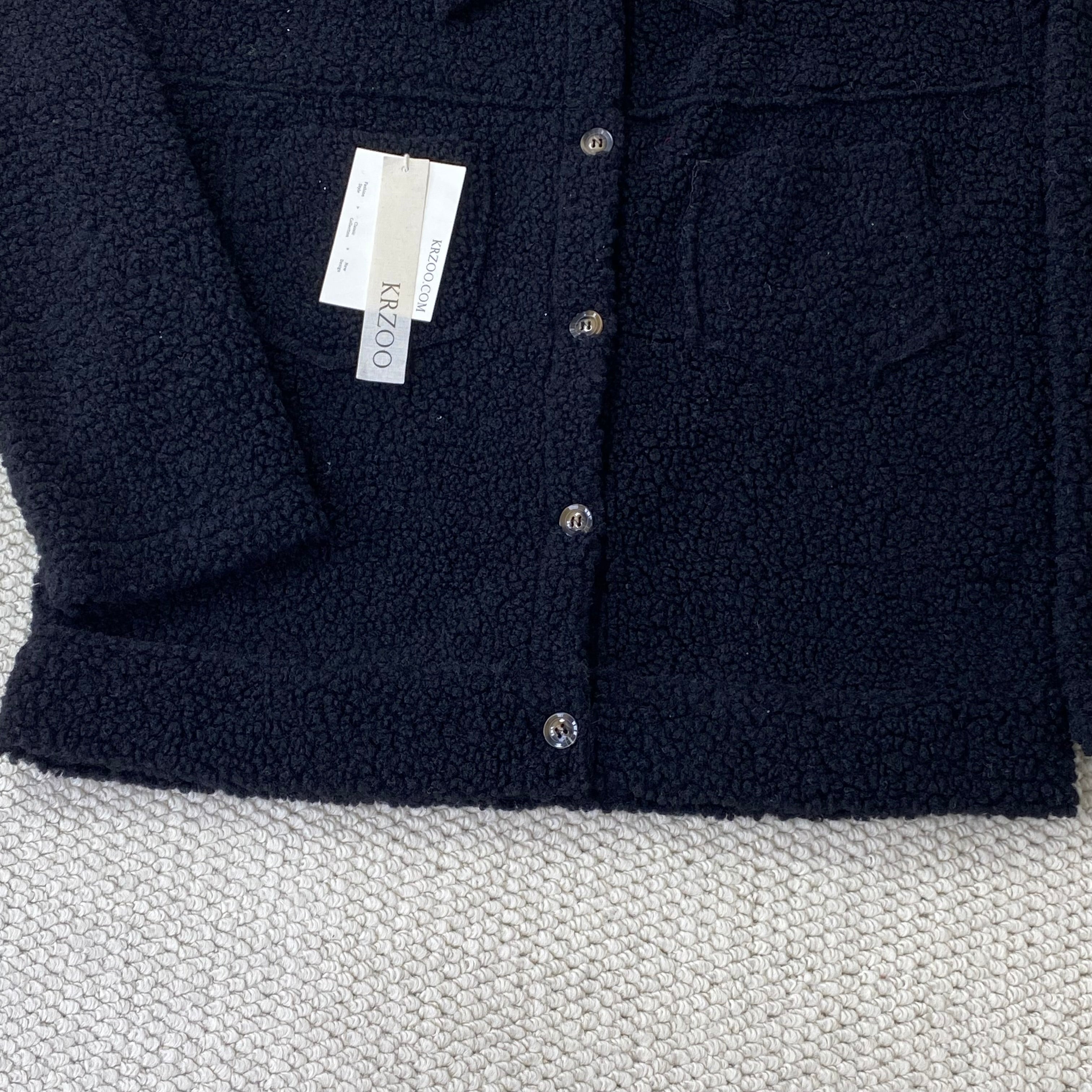 Collared single-breasted sheepskin coat