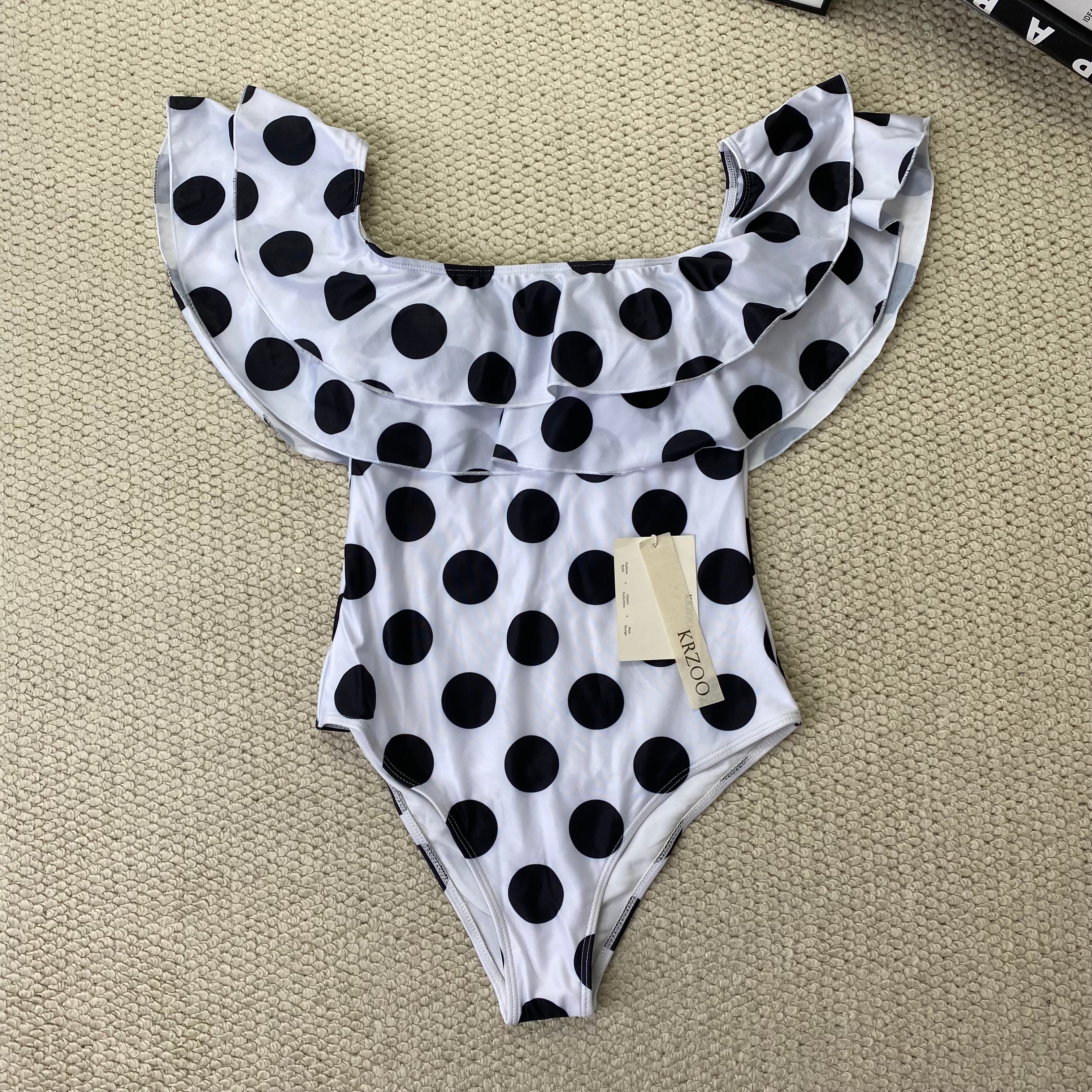 Off-the-shoulder polka-dot ruffled swimsuit