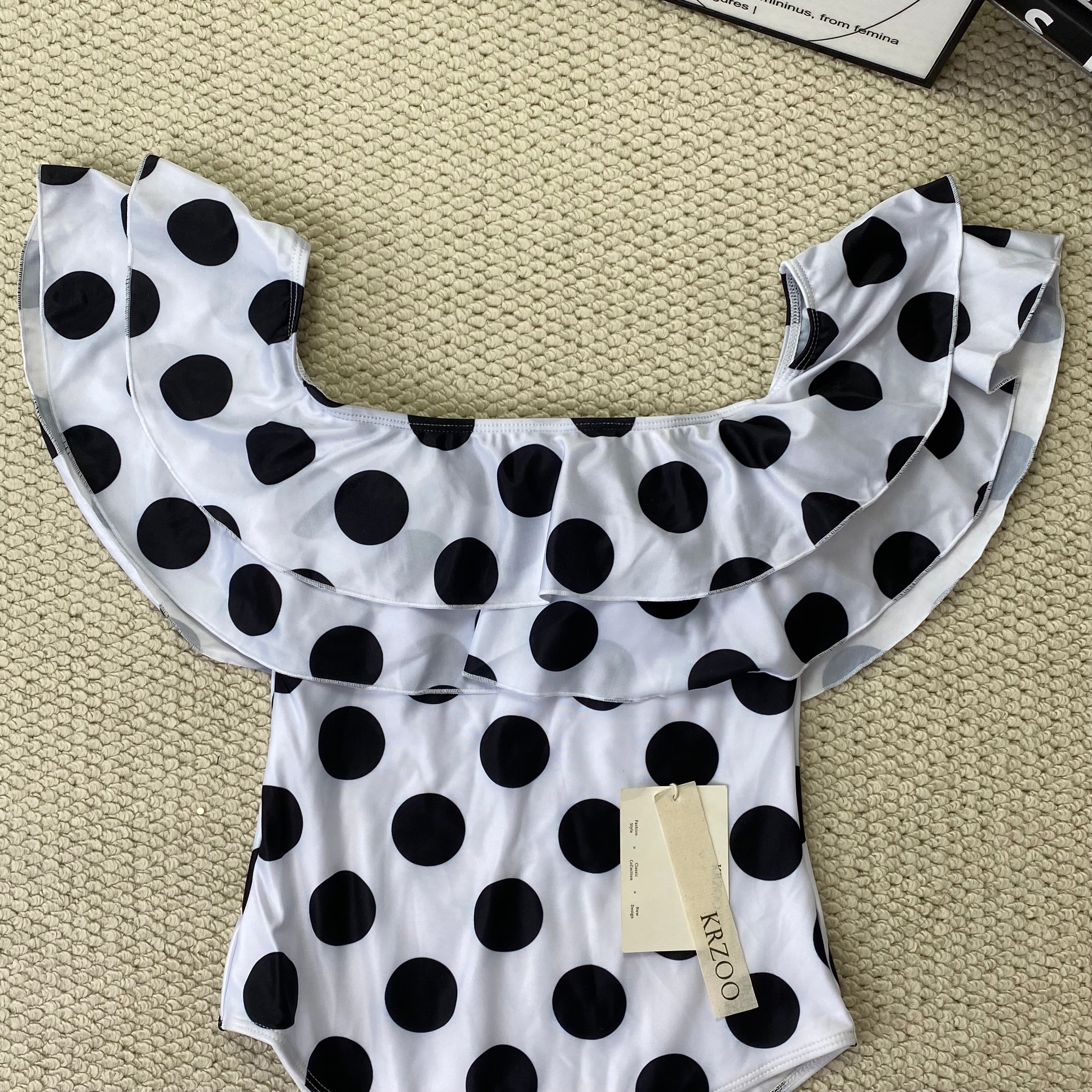 Off-the-shoulder polka-dot ruffled swimsuit