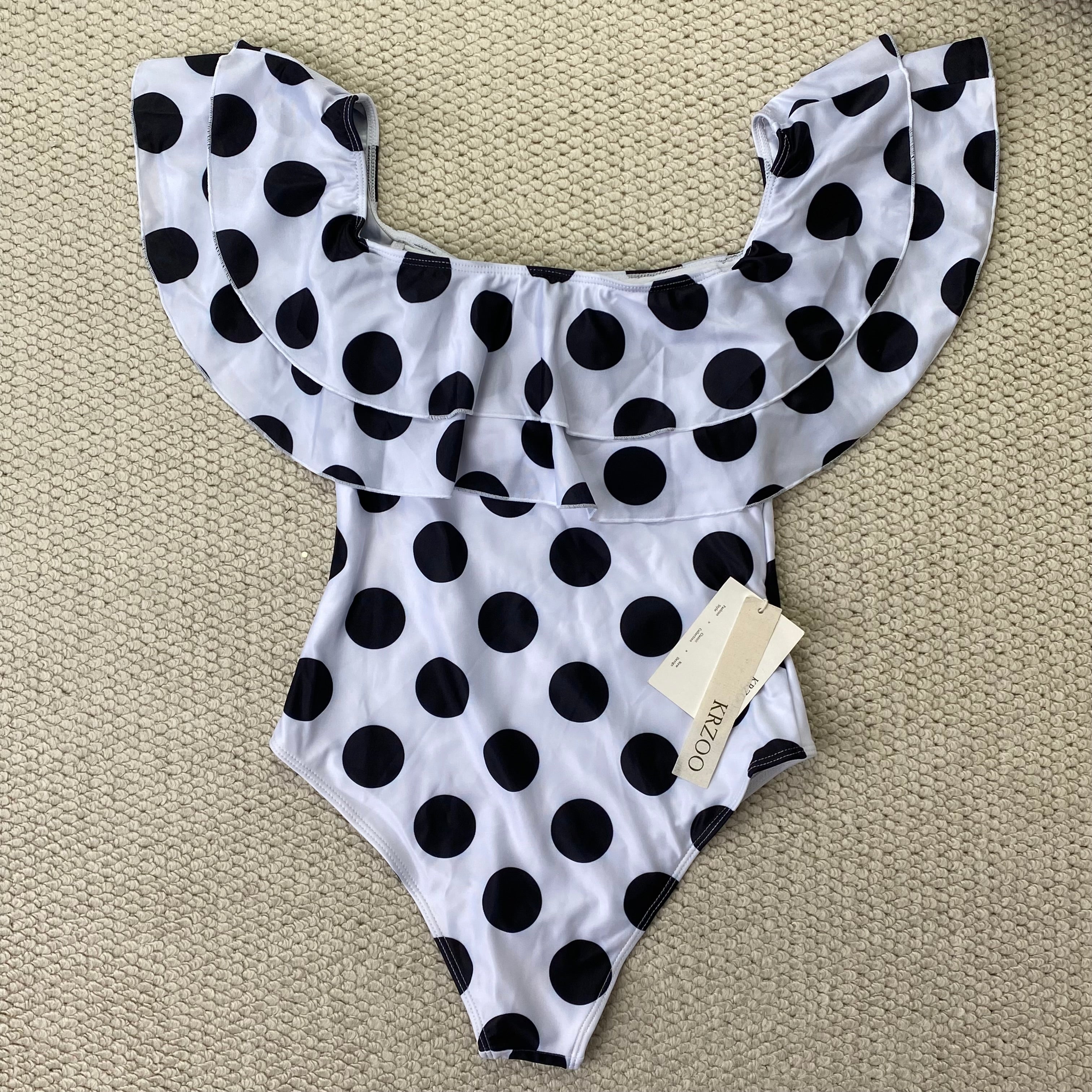 Off-the-shoulder polka-dot ruffled swimsuit