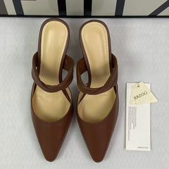 Thick leather strap with a headband and empty shoes