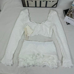 Blouse with wooden earflaps and half-skirt set
