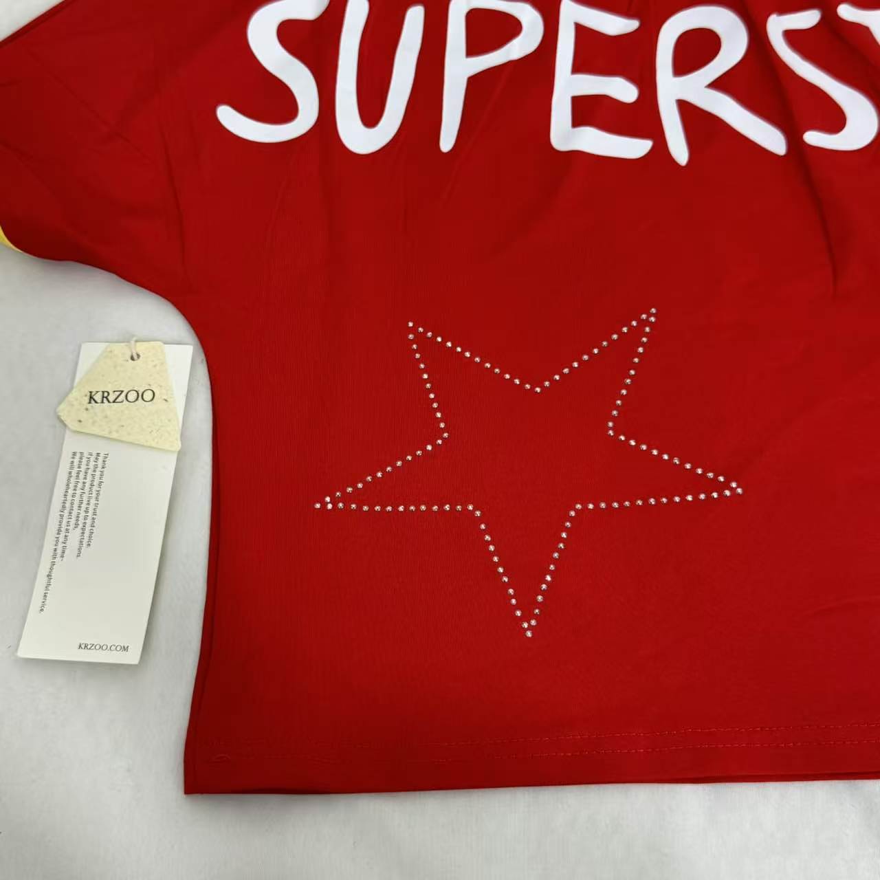Stitched diamond lettered fitted top
