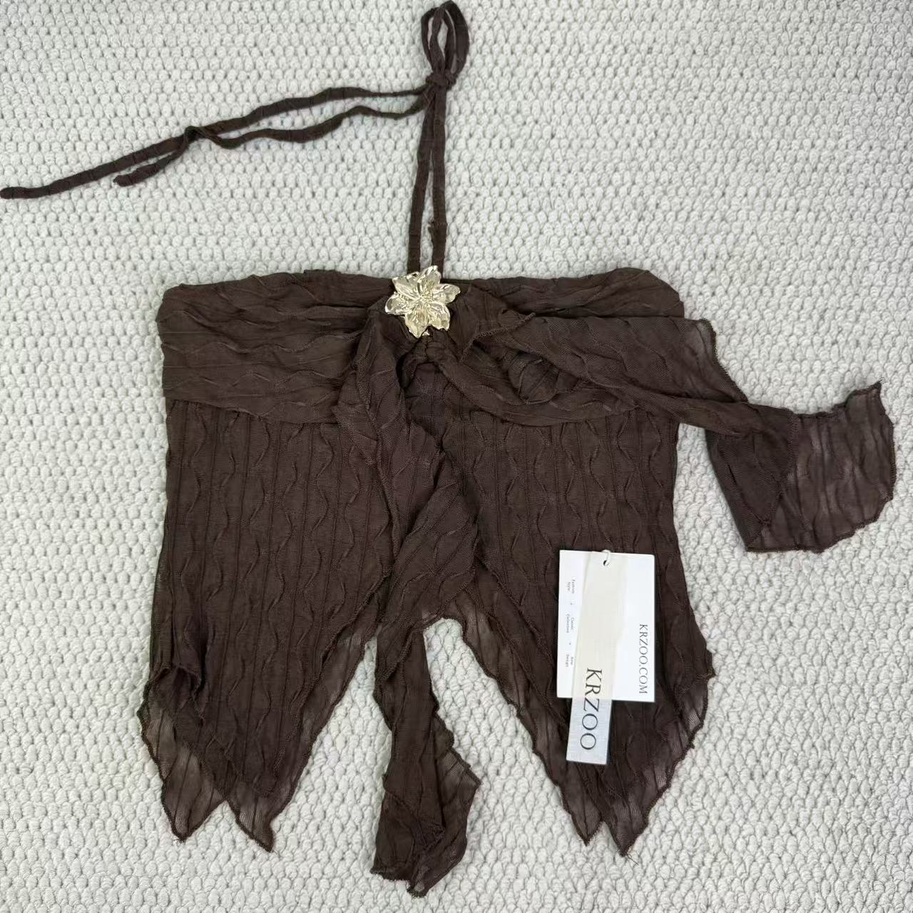 Irregular leaf-shaped sleeveless top with straps