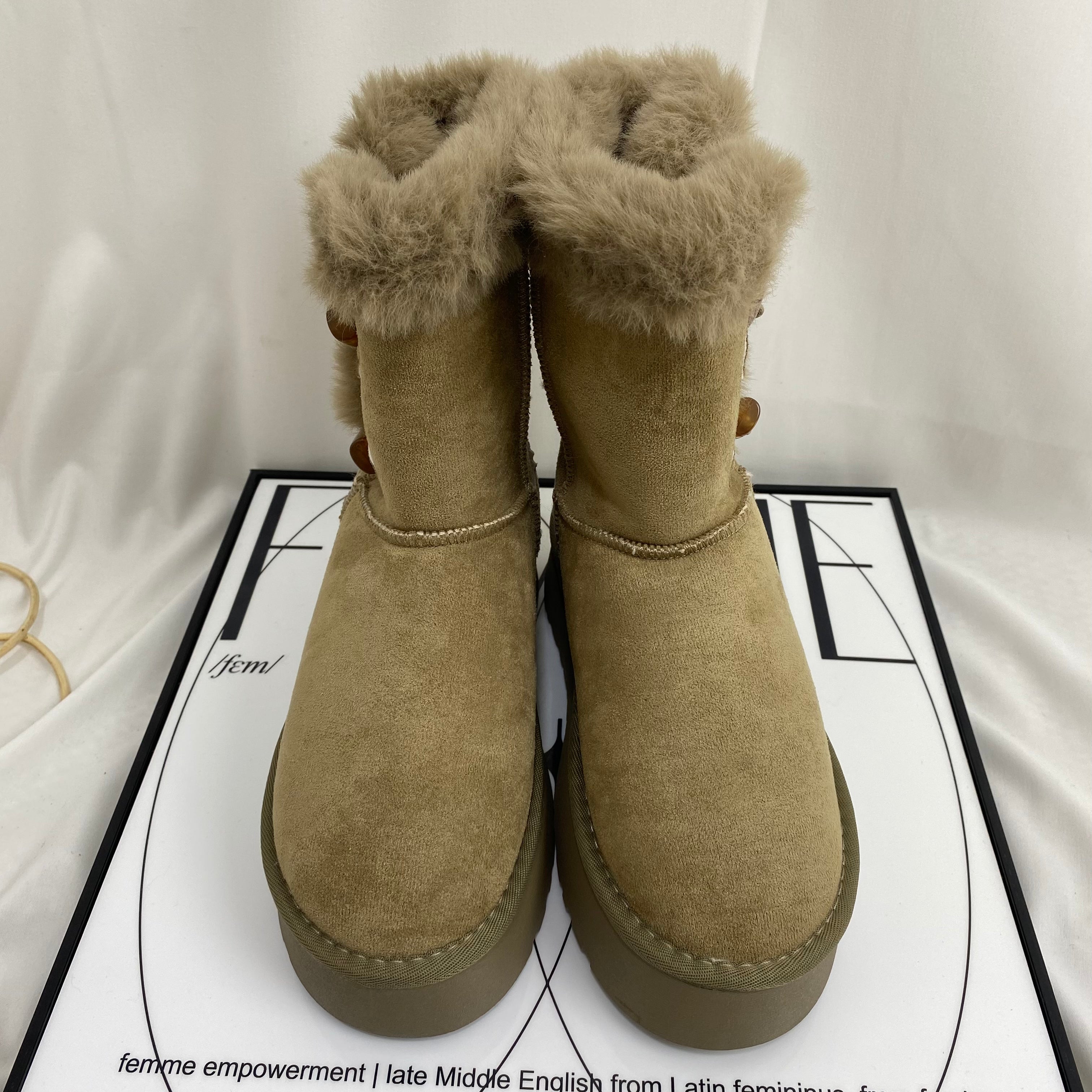 Shearling Horn-Buckled Snow Boots