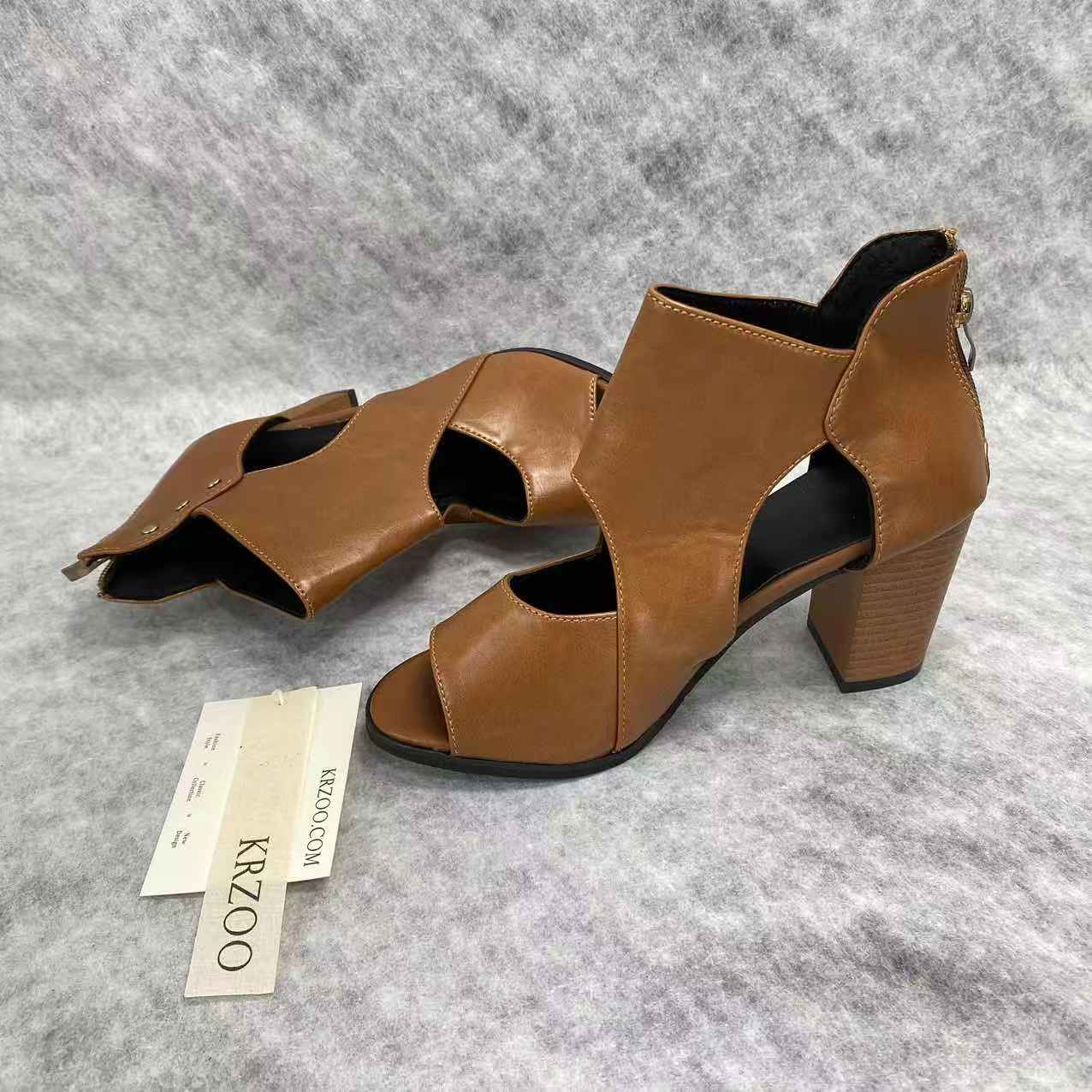 Fish-shaped hollowed-out thick heel high heels