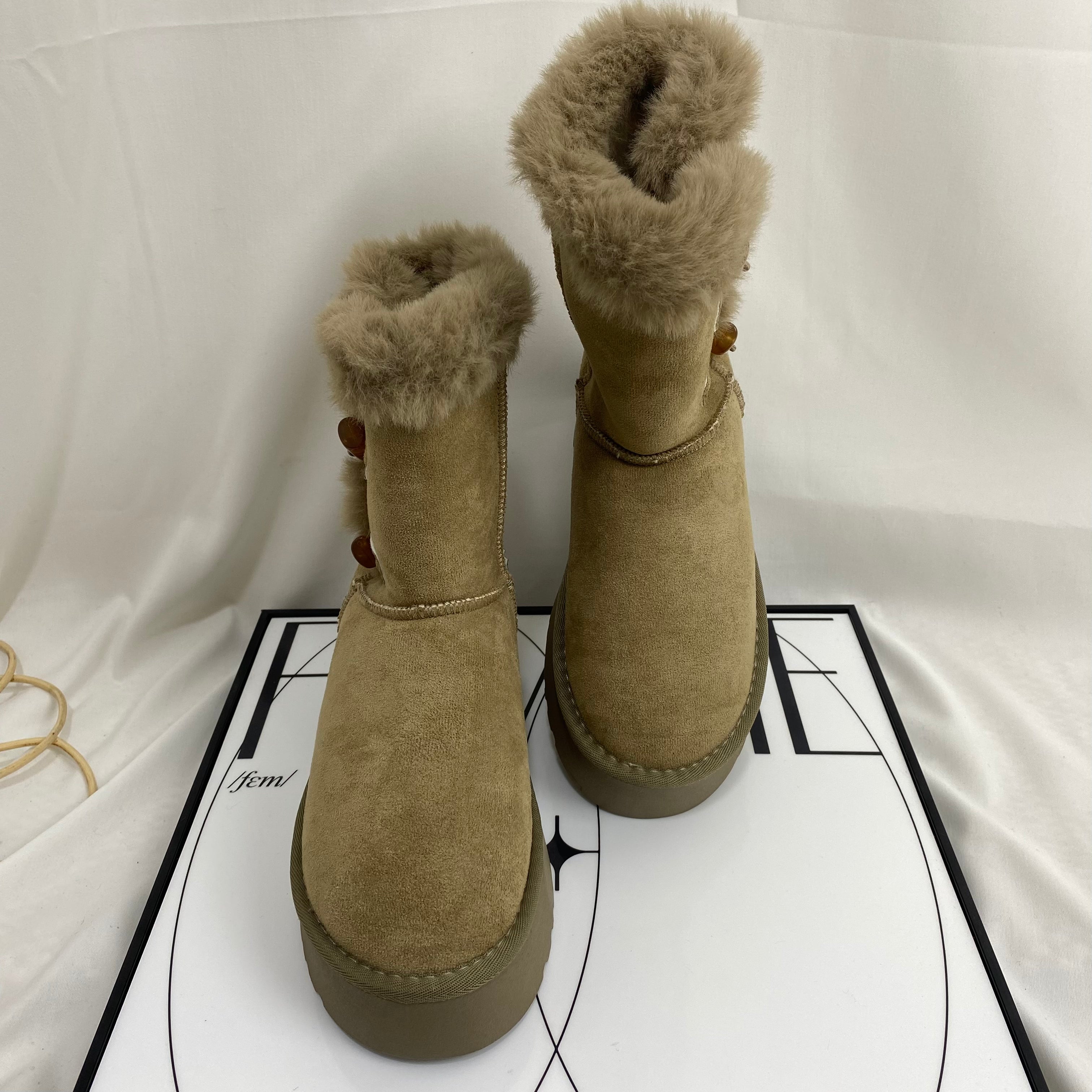 Shearling Horn-Buckled Snow Boots