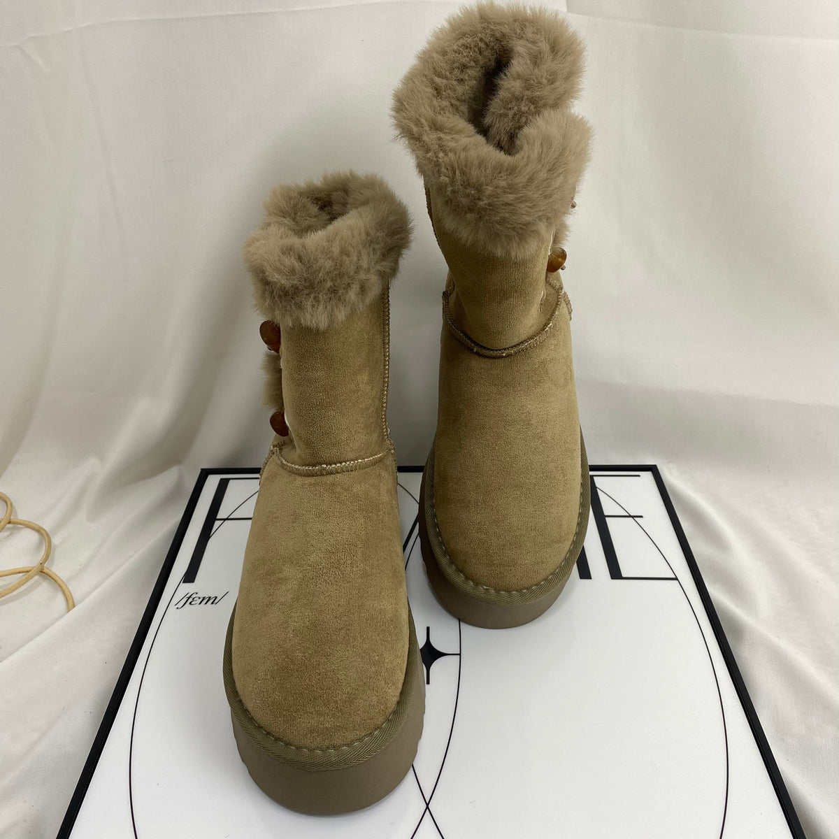 Shearling Horn-Buckled Snow Boots