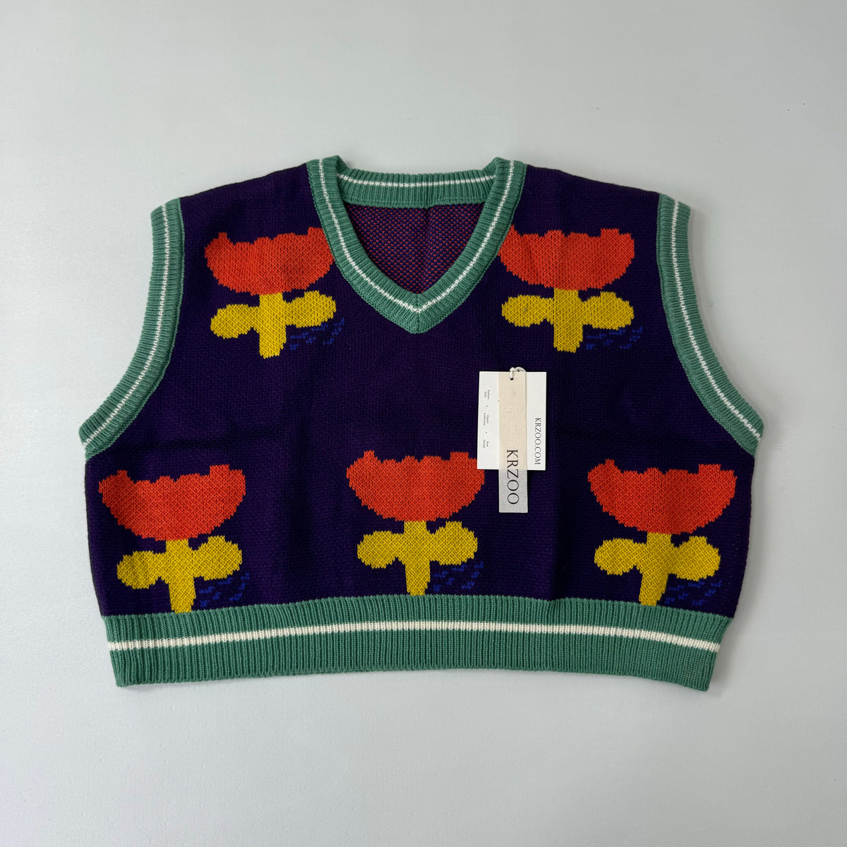 Purple embroidered sweater vest