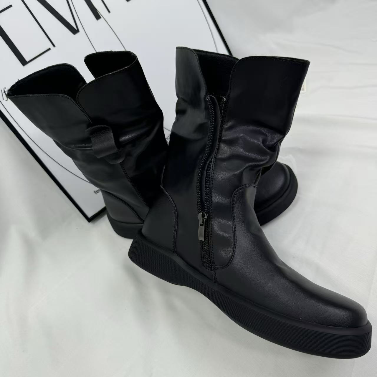 Ruffled side-zip ankle boots