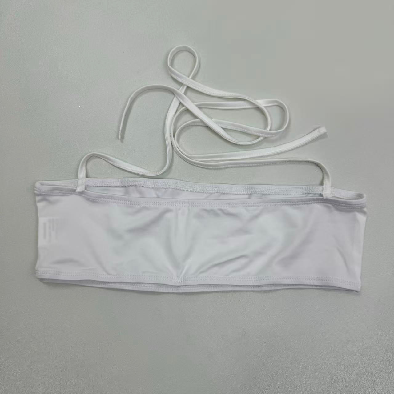 Cotton one-piece neckless plunging top