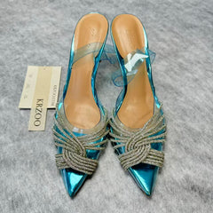Pointed-toe transparent crystal high heels
