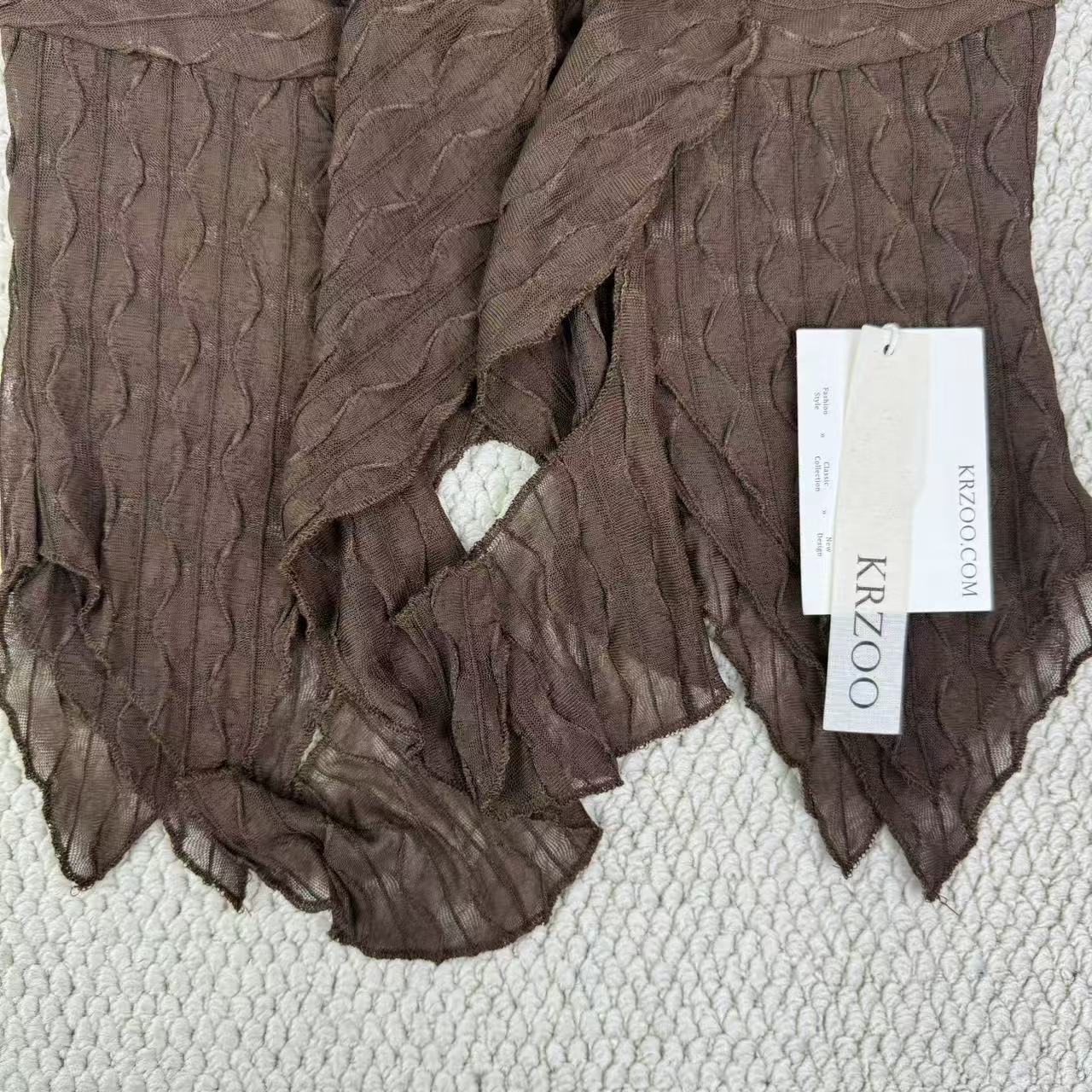 Irregular leaf-shaped sleeveless top with straps
