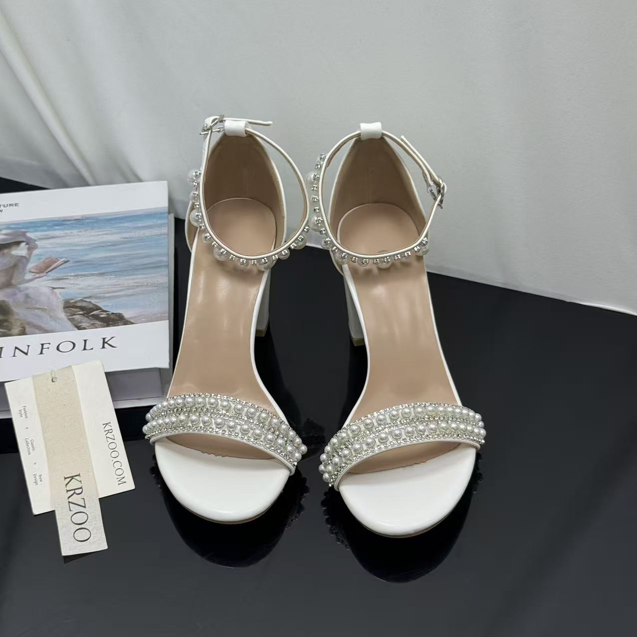 White ankle strap pearl necklace sandals