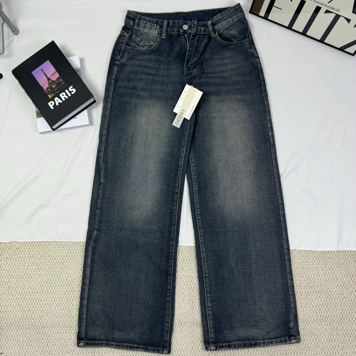 Washed and distressed denim pants