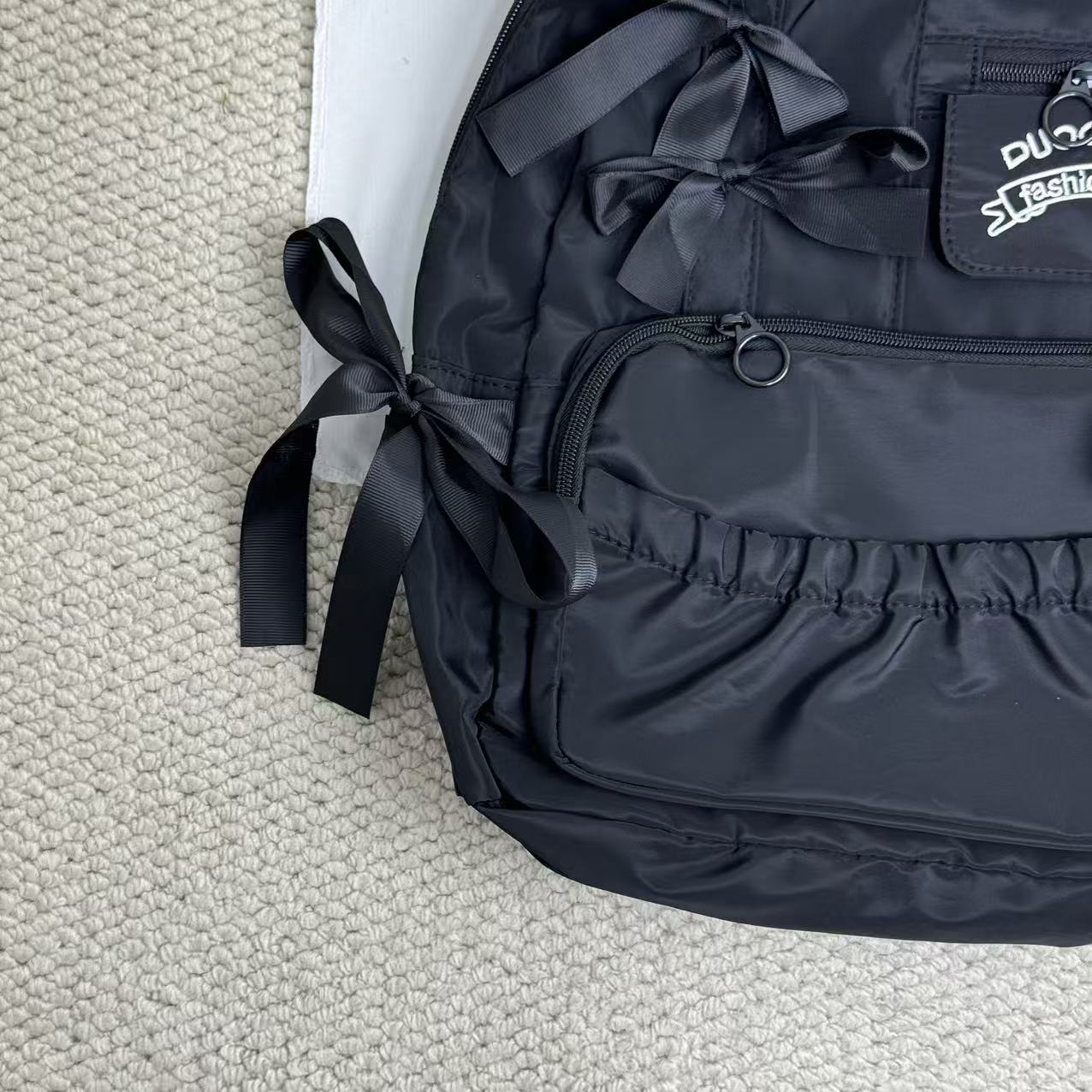 Compact pleated backpack