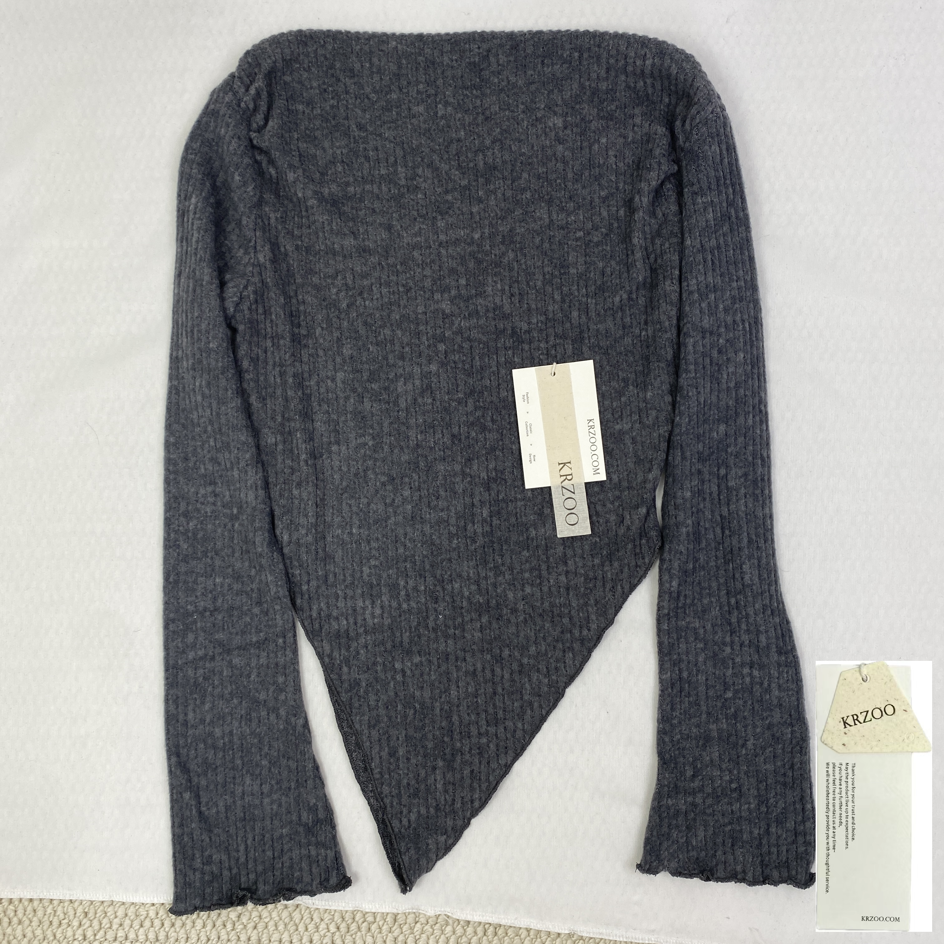 Irregularly cut, flared collar top