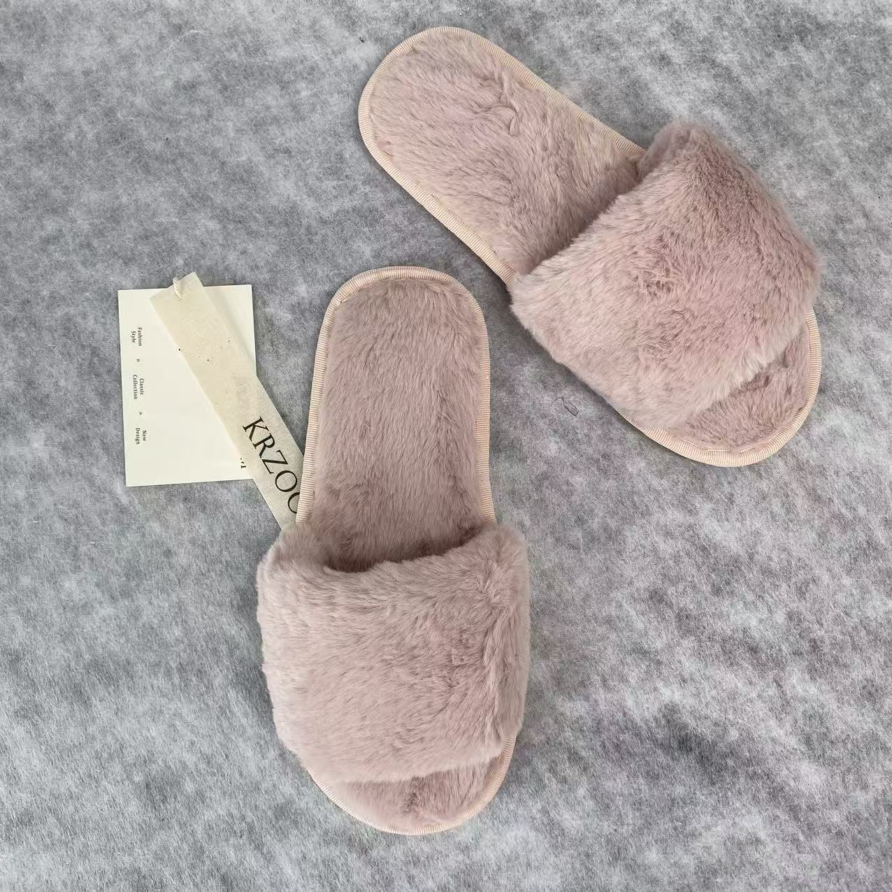 Soft plush slippers with short fur on the sole