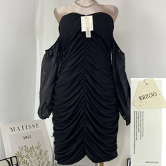 A tight-fitting short dress with a plunging neckline