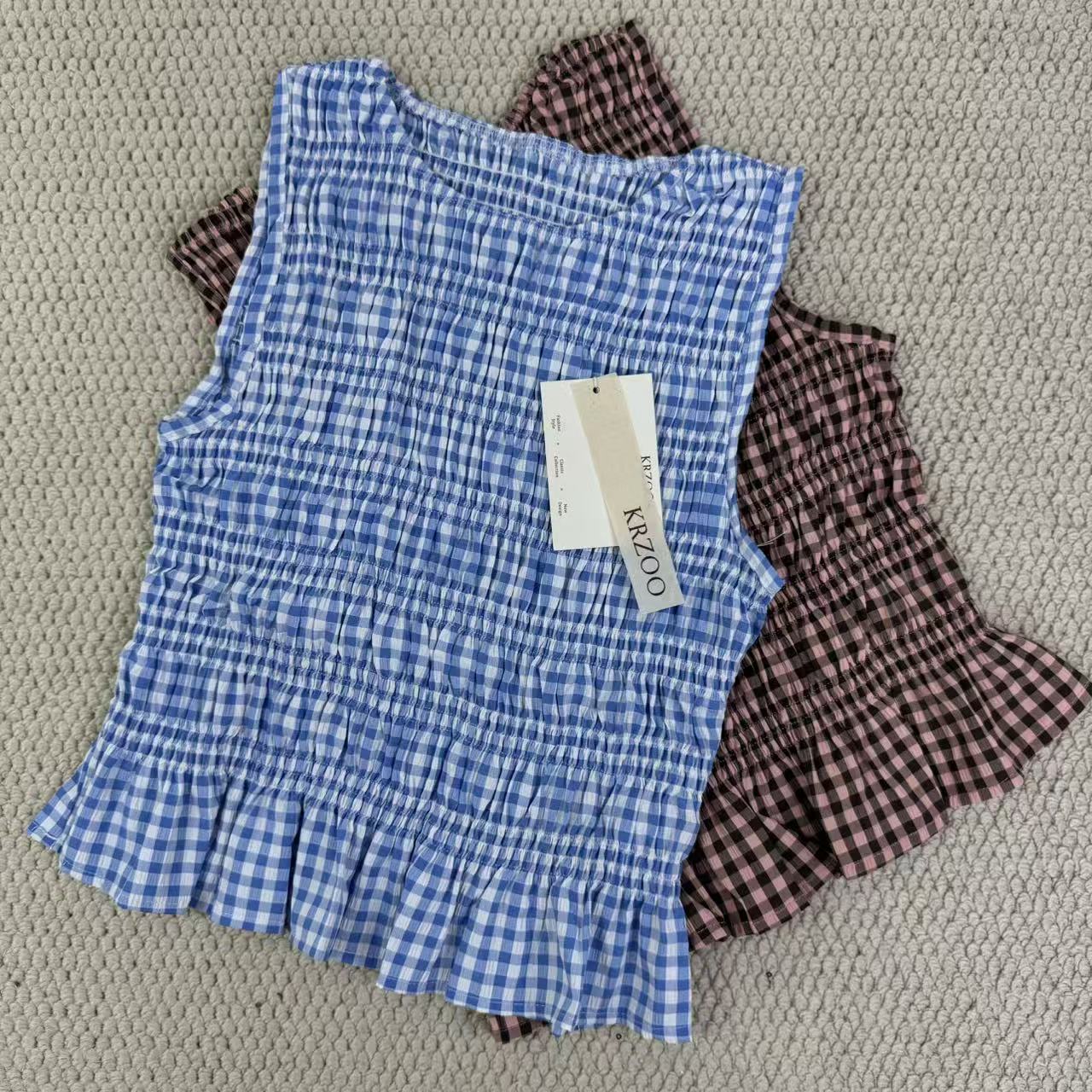 A sleeveless front-back vest