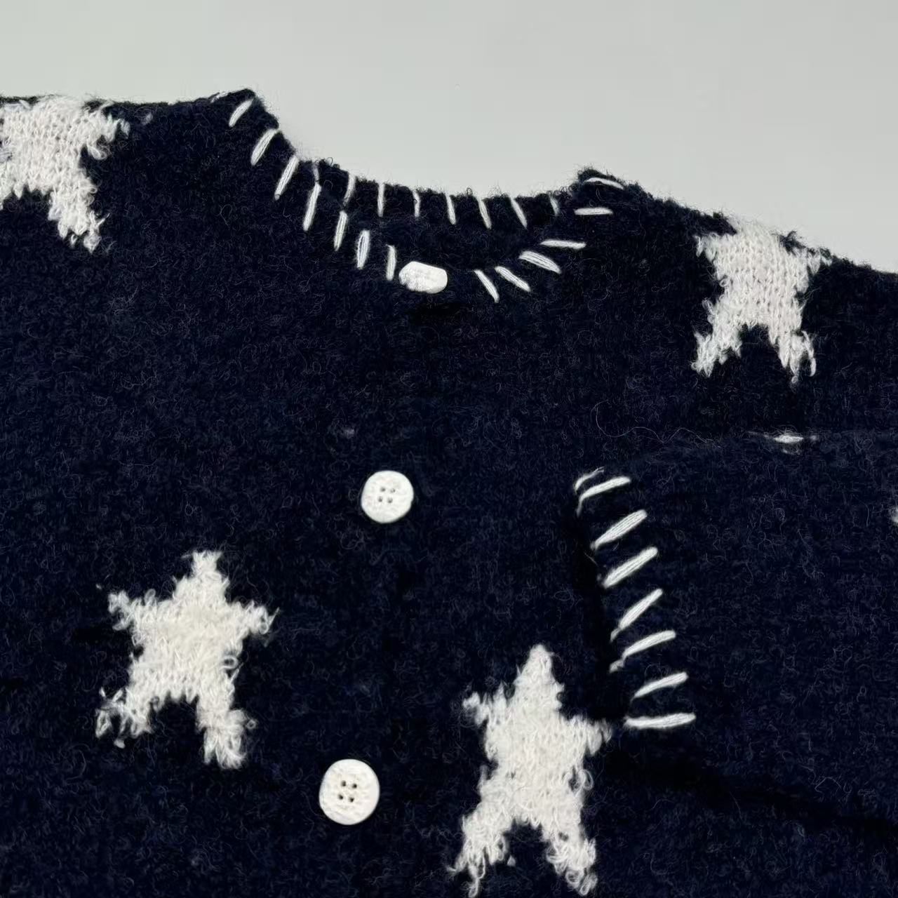Dark blue star-patterned knitted sweater coat