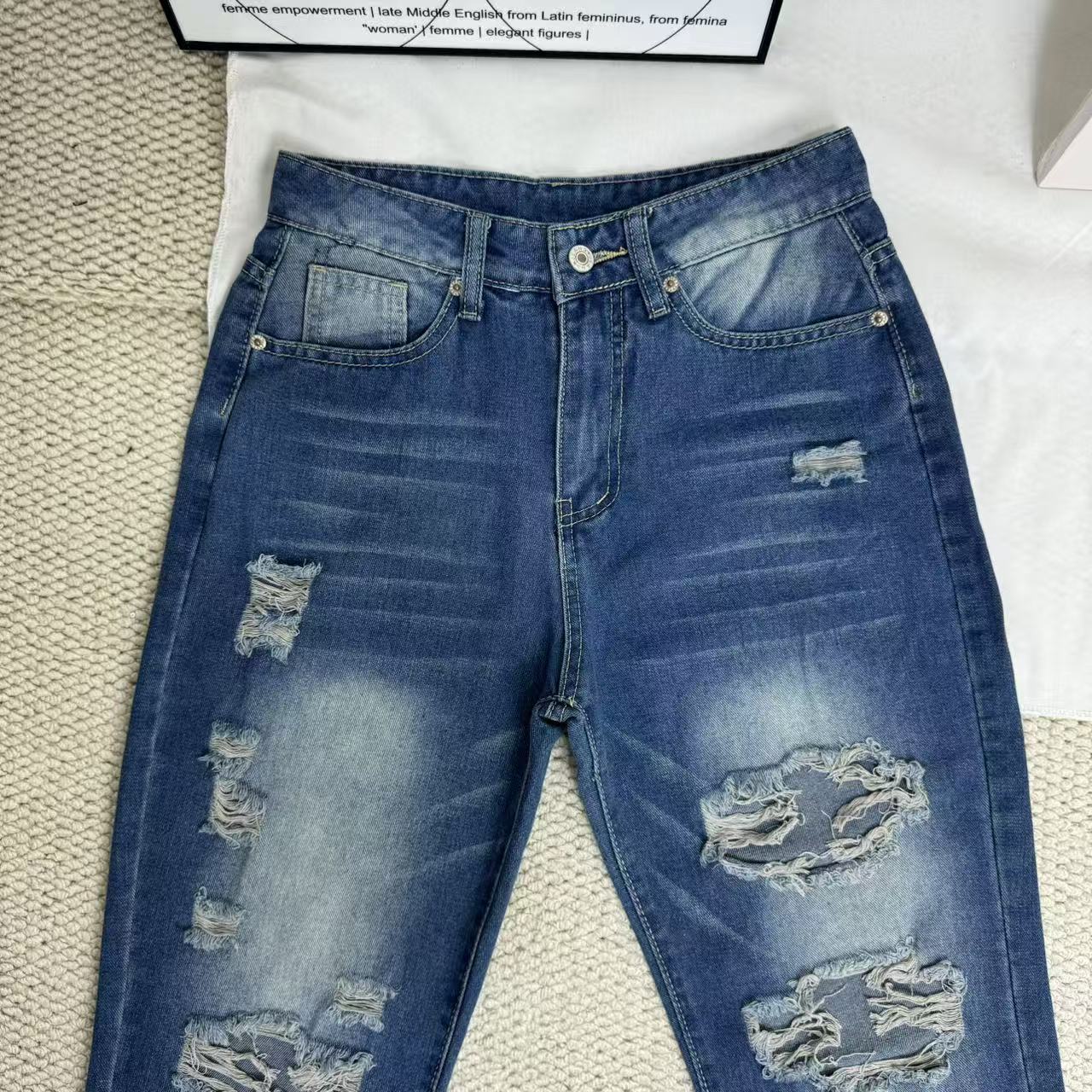 High-Waisted Ripped Jeans