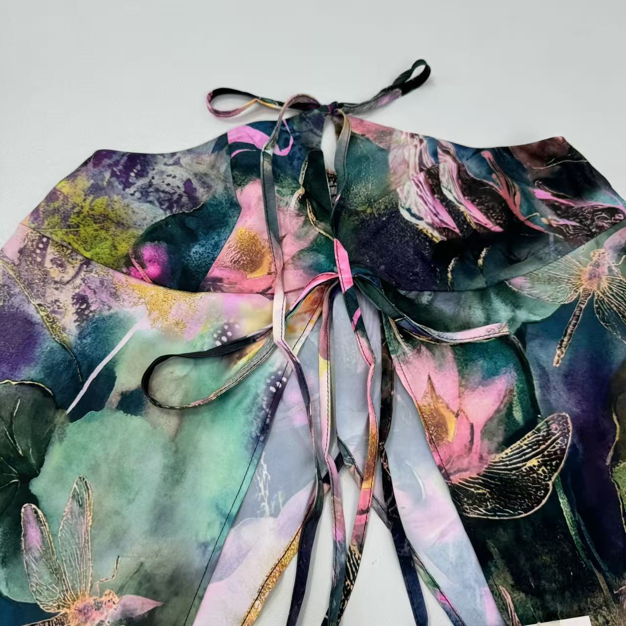 Strappy printed halter-necked frilled top with ties
