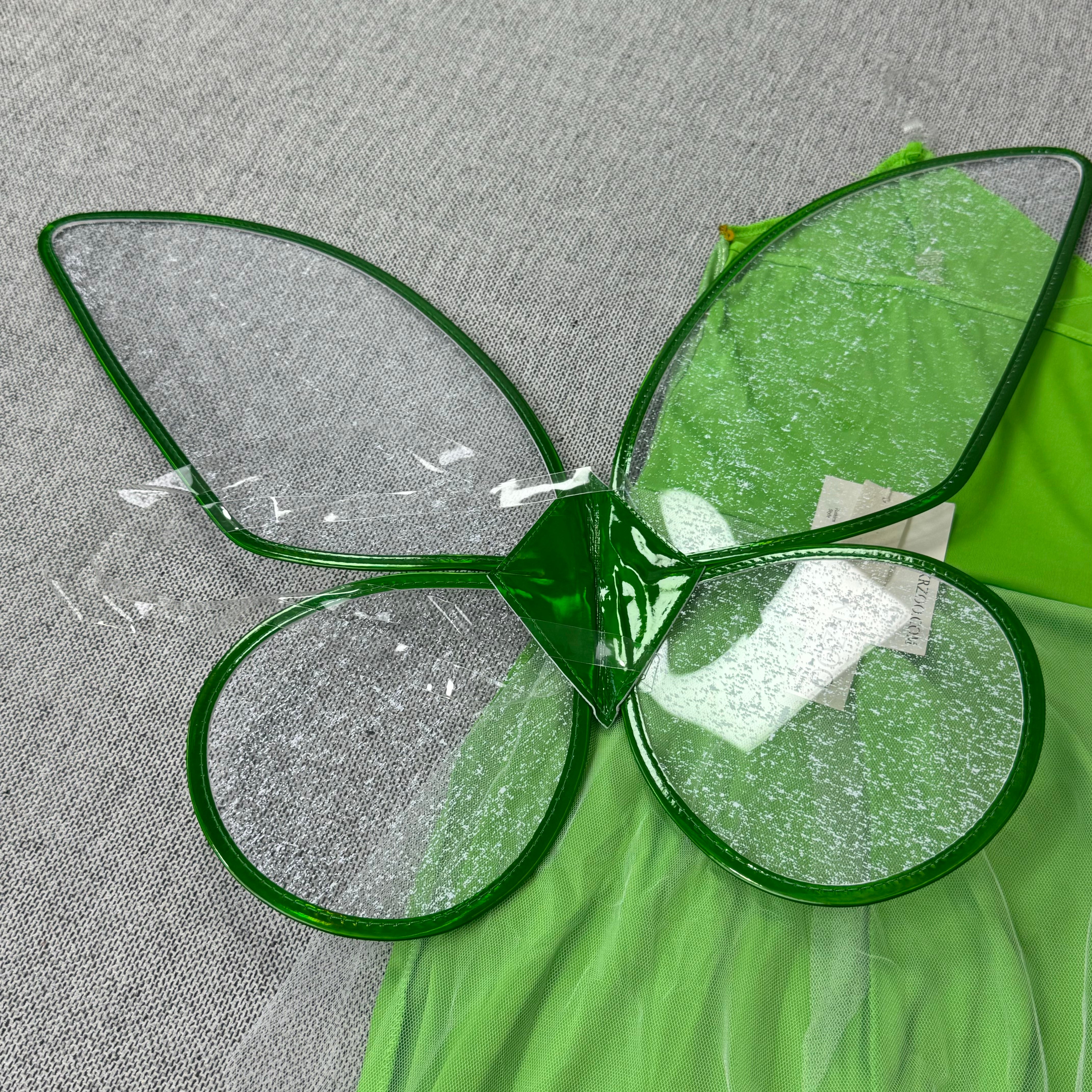 The fringed skirt of the fairy's wings
