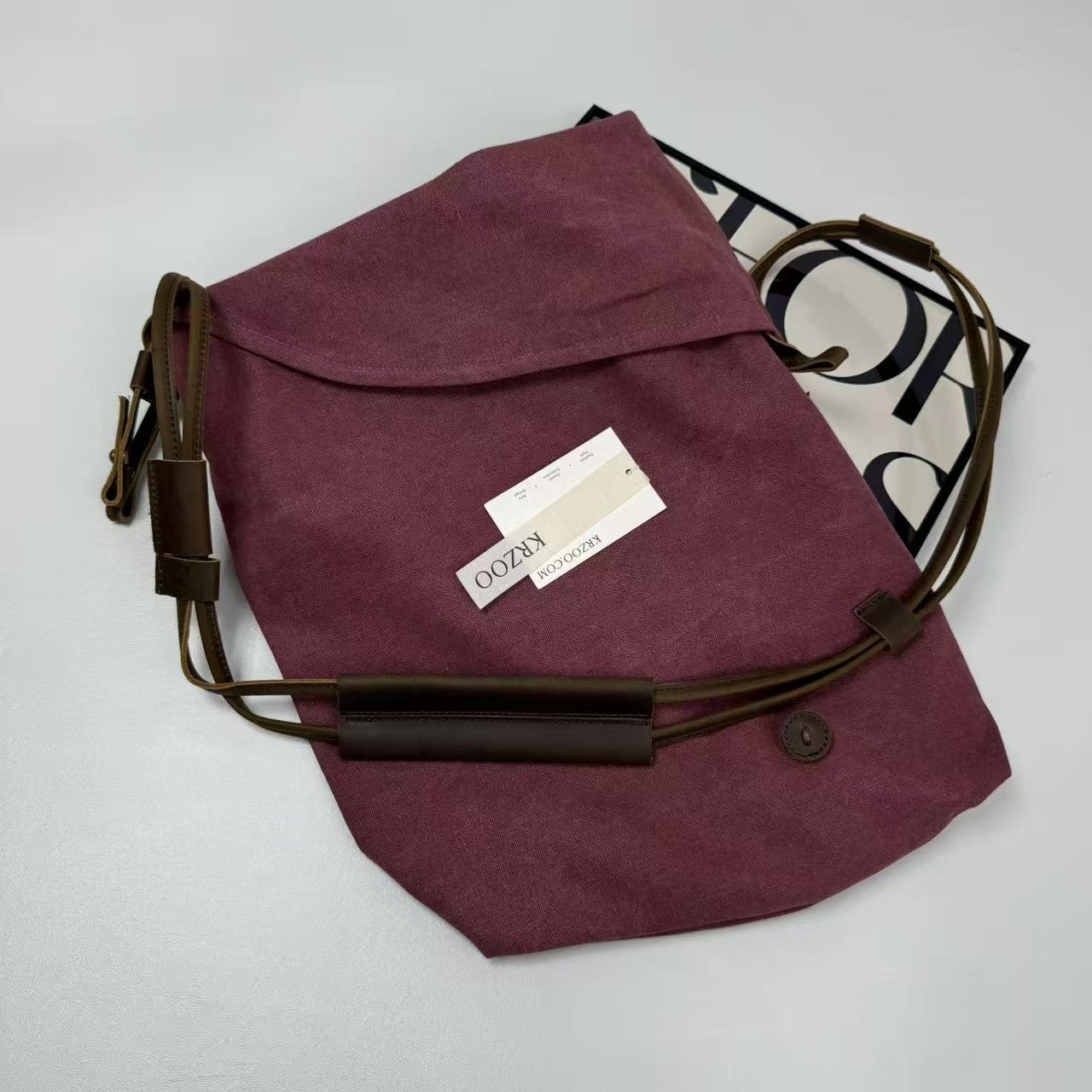 Leather strap crossbody messenger bag