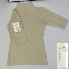 A fitted mid-neck knitted sweater