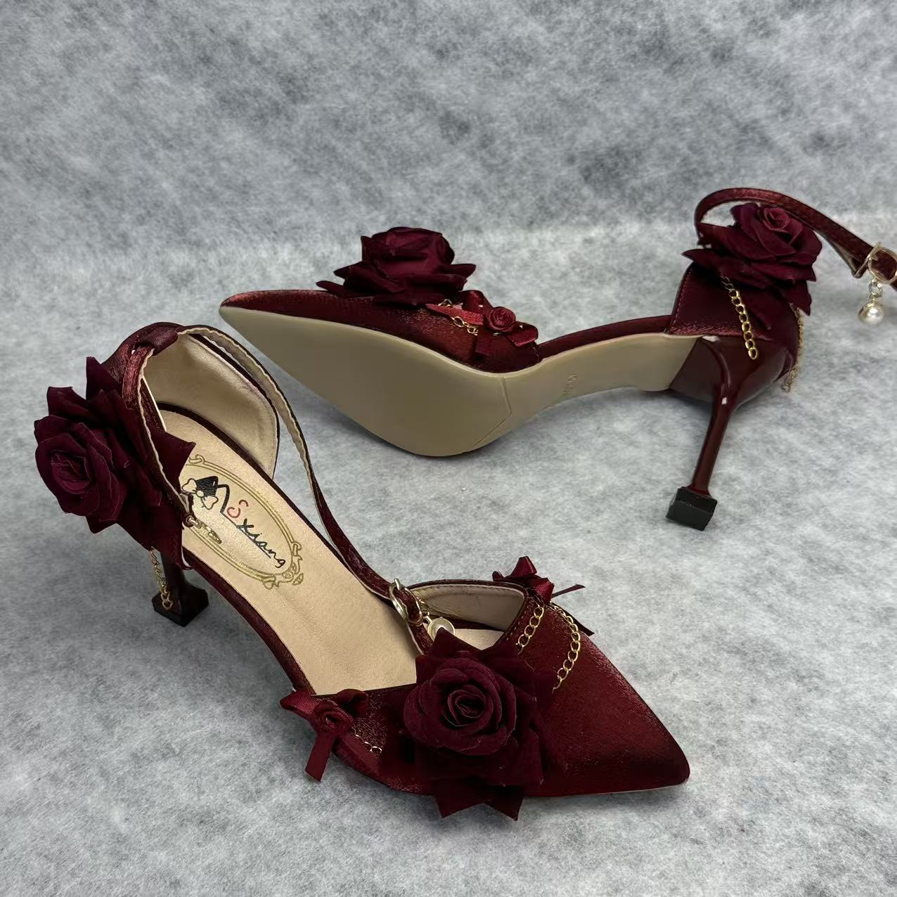 Rose pointed-toe high heels