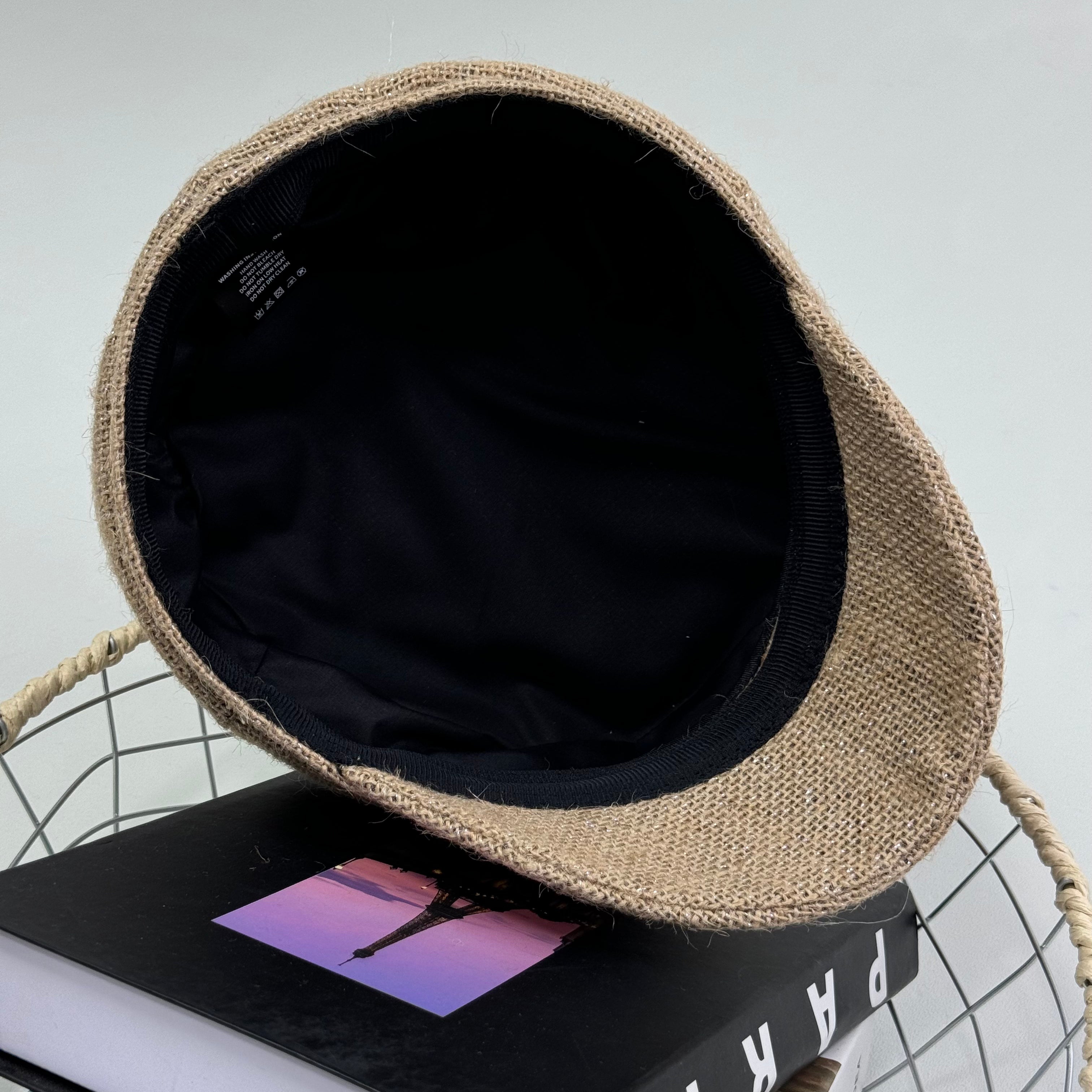 Woven straw cap with a flat top
