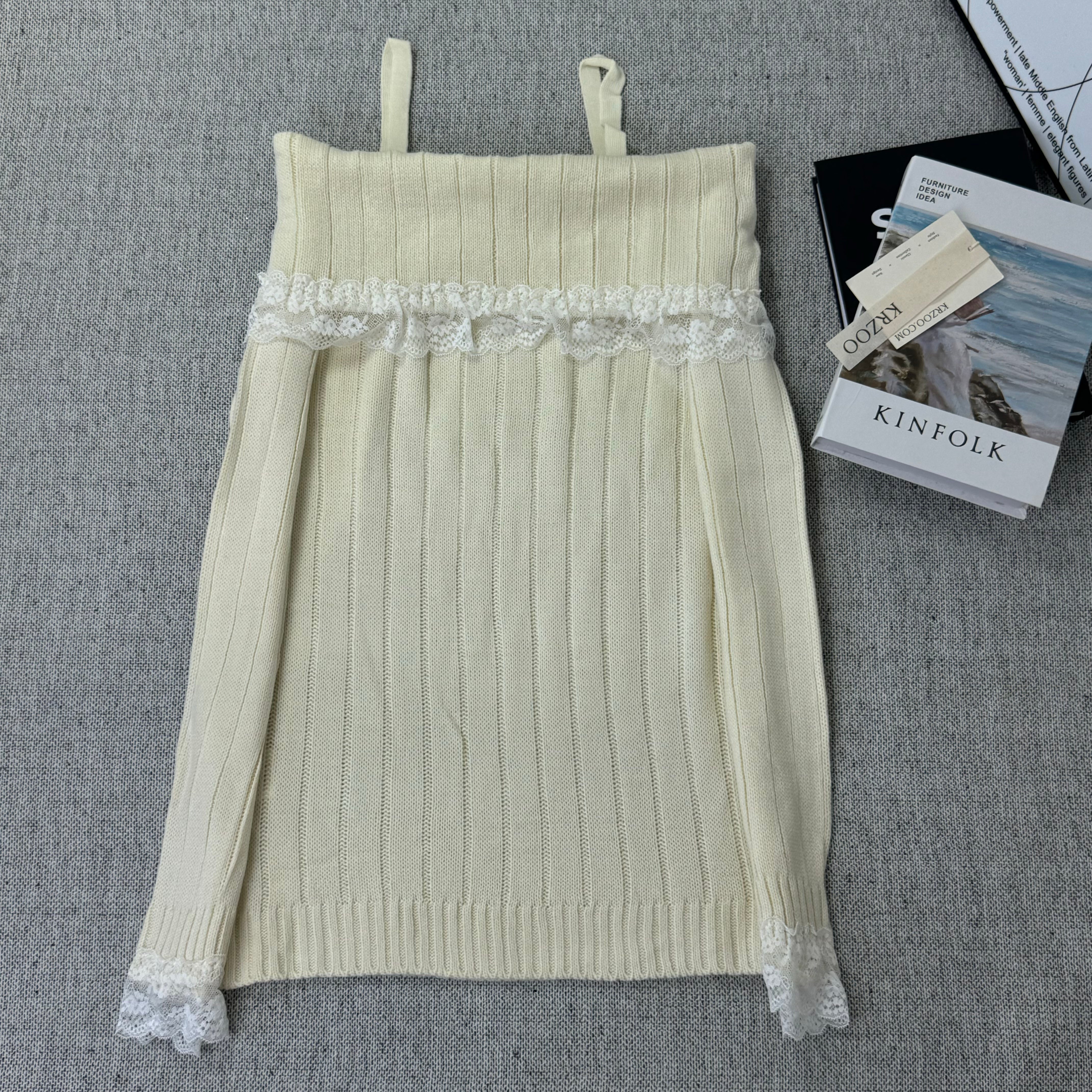 Lace trimmed one-shoulder sweater